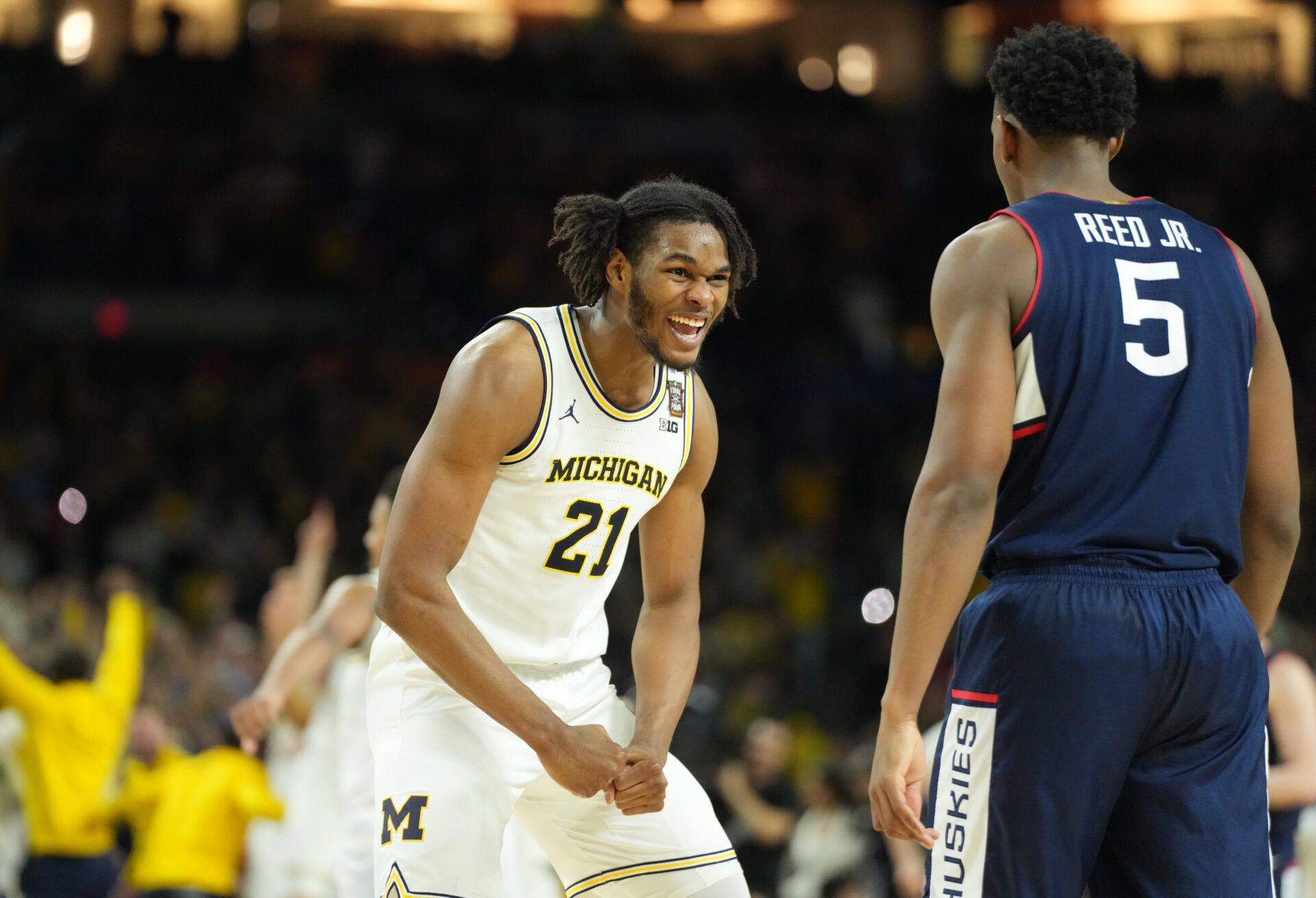 Michigan Wolverines forward Morez Johnson Jr. (21) celebrates after defeating the Connecticut Huskies in the national championship of the Final Four of the men's 2026 NCAA Tournament at Lucas Oil Stadium.