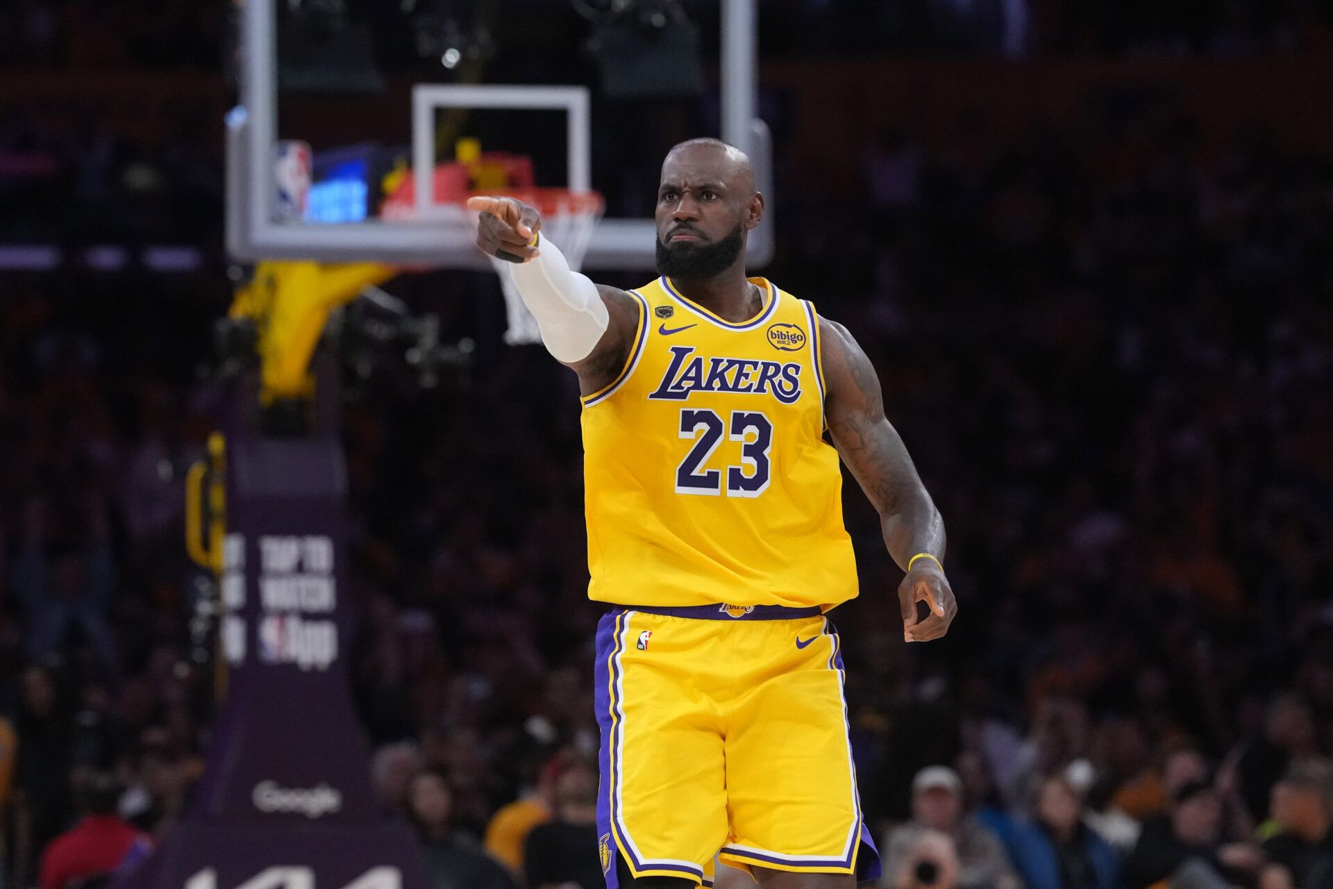 Los Angeles Lakers forward LeBron James (23) gestures against the Houston Rockets in the first half during game one of the first round of the 2026 NBA Playoffs at Crypto.com Arena.