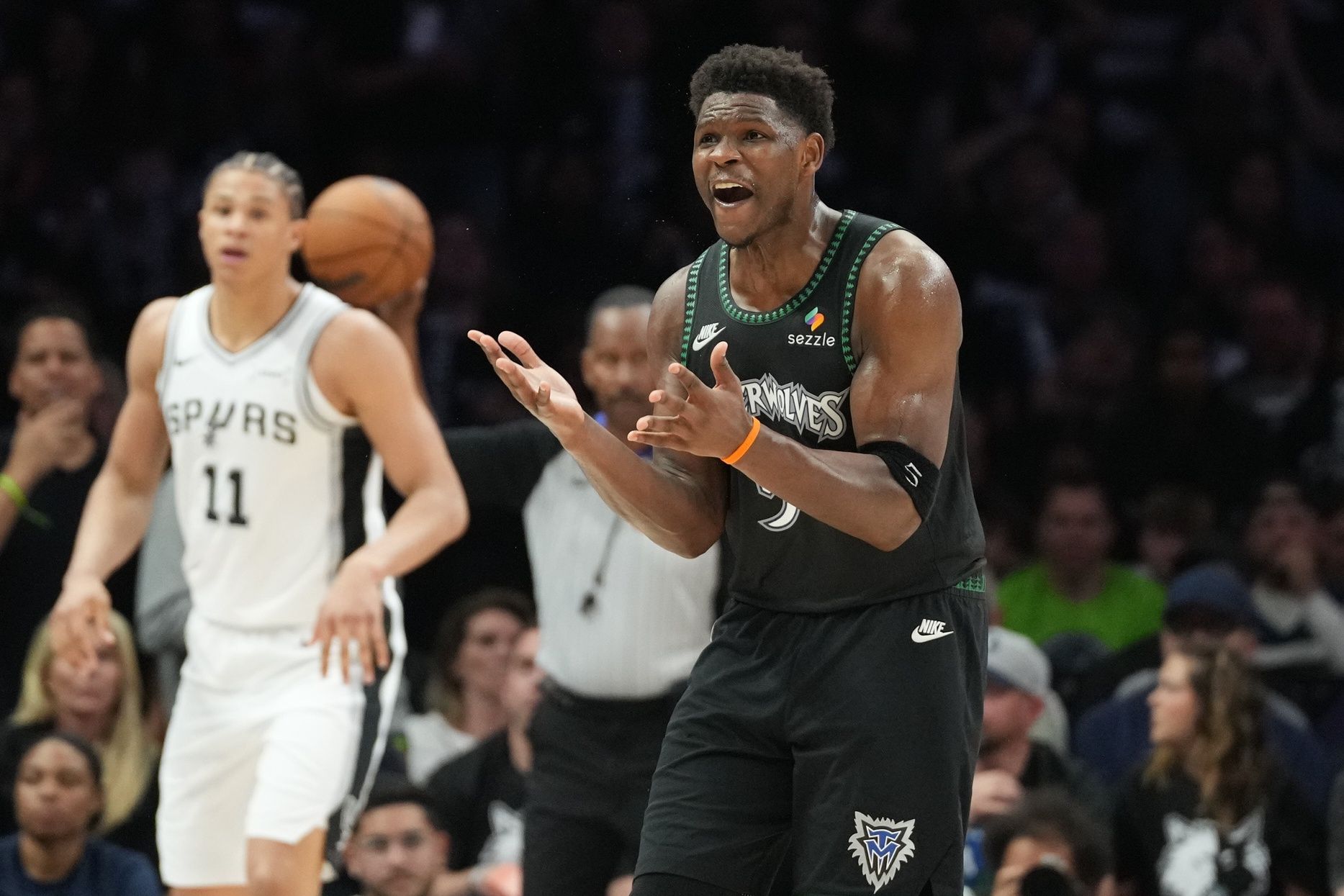 Minnesota Timberwolves guard Anthony Edwards (5) reacts to call on the court against the San Antonio Spurs in the second half during game six of the second round of the 2026 NBA Playoffs at Target Center.