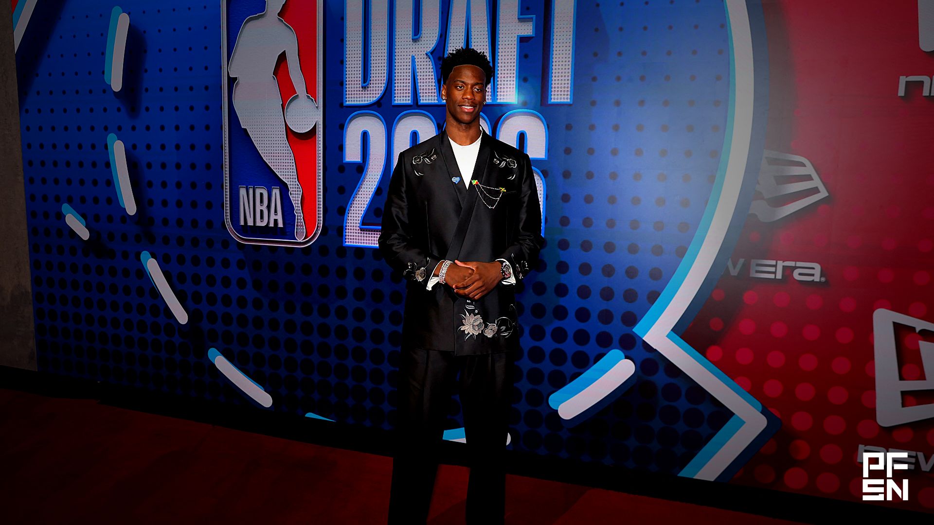 Draft prospect AJ Dybantsa poses for photos on the red carpet before the 2026 NBA draft at Barclays Center.