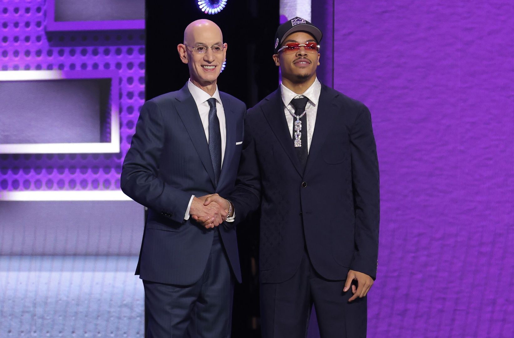 NBA commissioner Adam Silver greets the seventh pick in the 2026 NBA draft, Arkansas guard Darius Acuff Jr. after he was selected by the Sacramento Kings at Barclays Center.