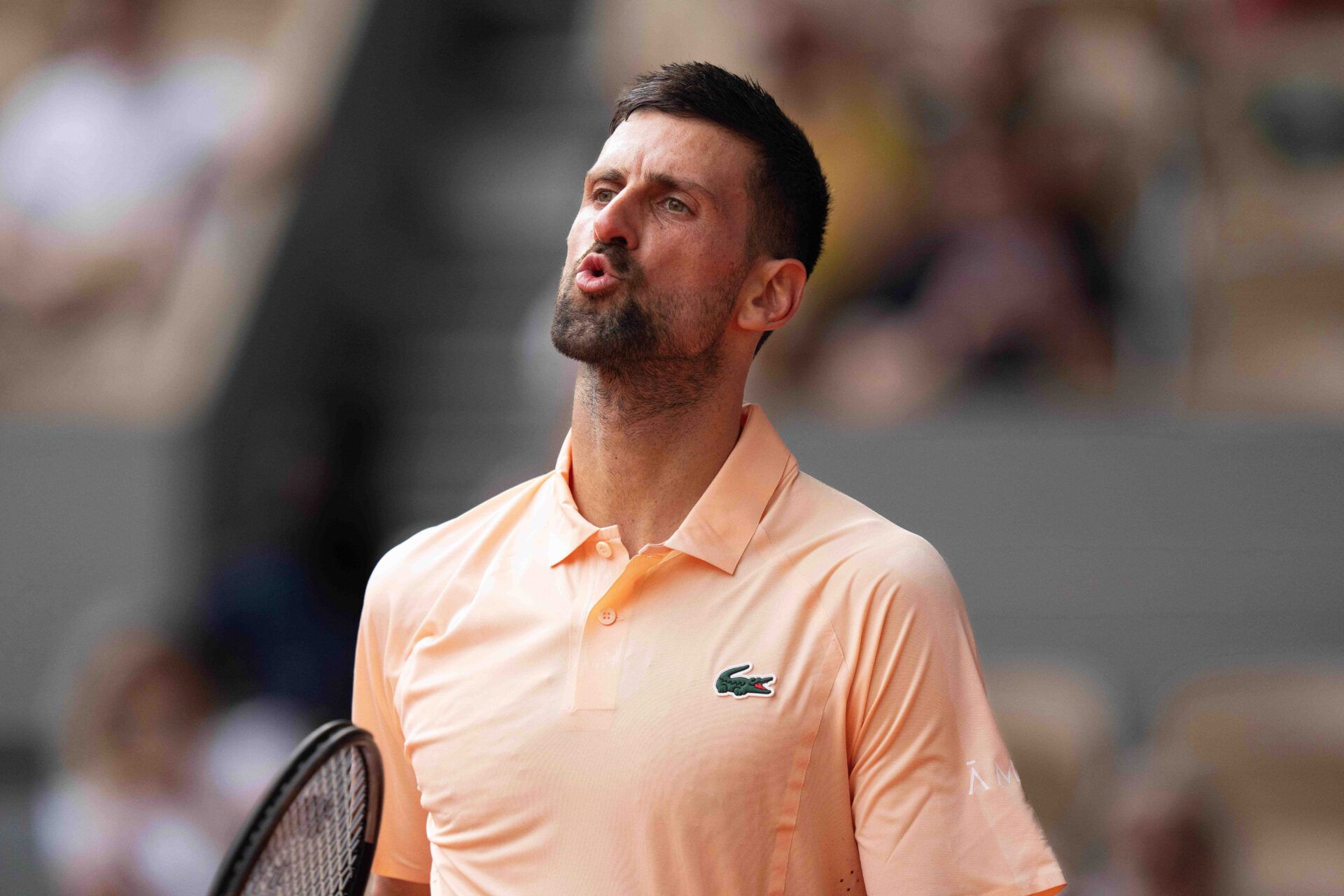 Novak Djokovic of Serbia reacts during his match against Joao Fonseca of Brazil on day six at Stade Roland Garros.