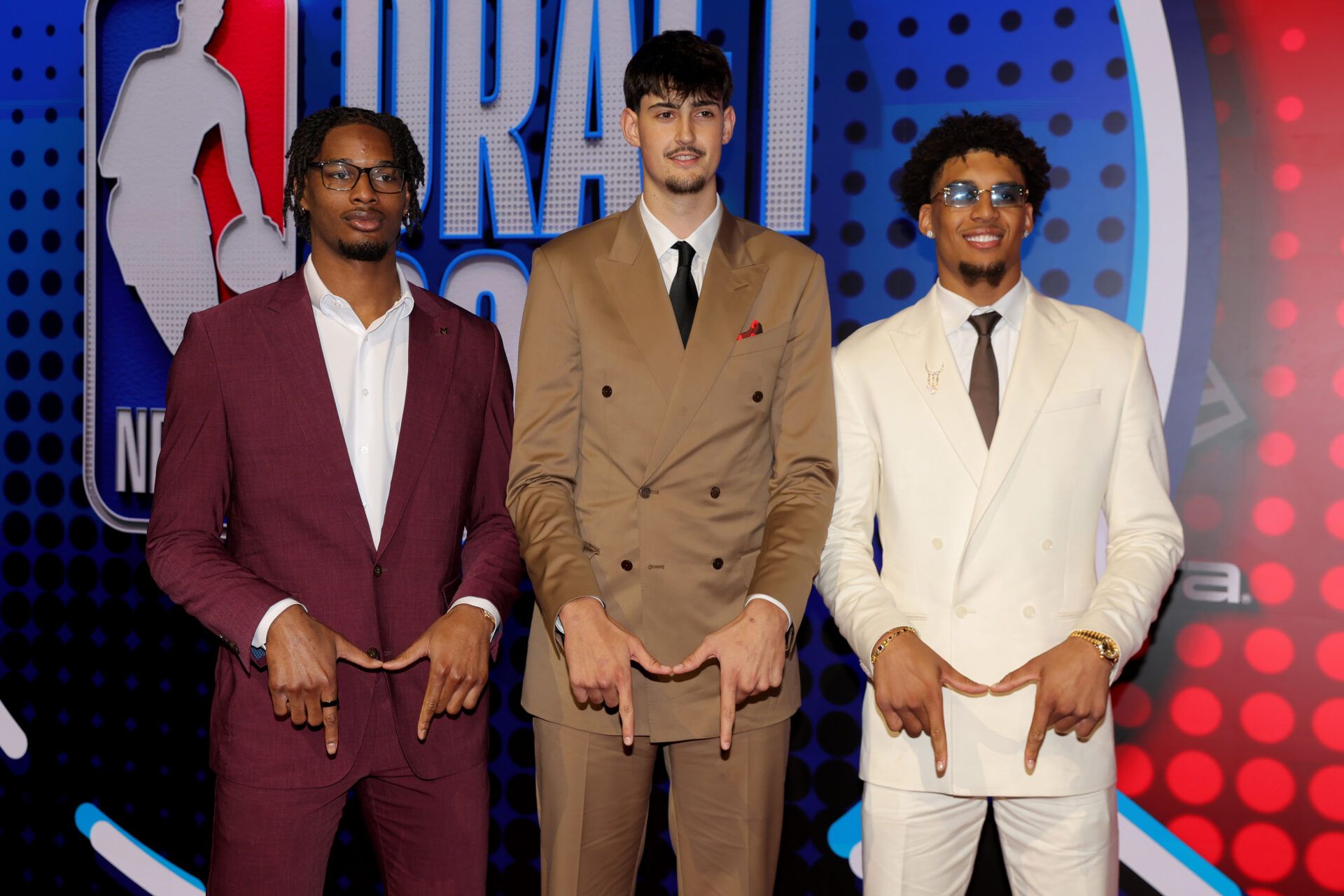 Draft prospects Morez Johnson Jr. (left to right) Aday Mara and Yaxel Lendeborg pose for photos on the red carpet before the 2026 NBA draft at Barclays Center.