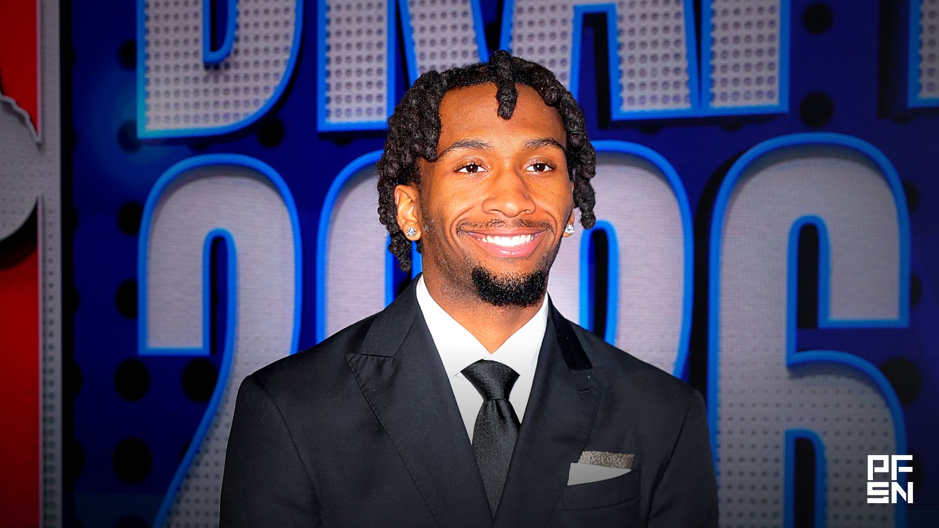 Draft prospect Darryn Peterson poses for photos on the red carpet before the 2026 NBA draft at Barclays Center.