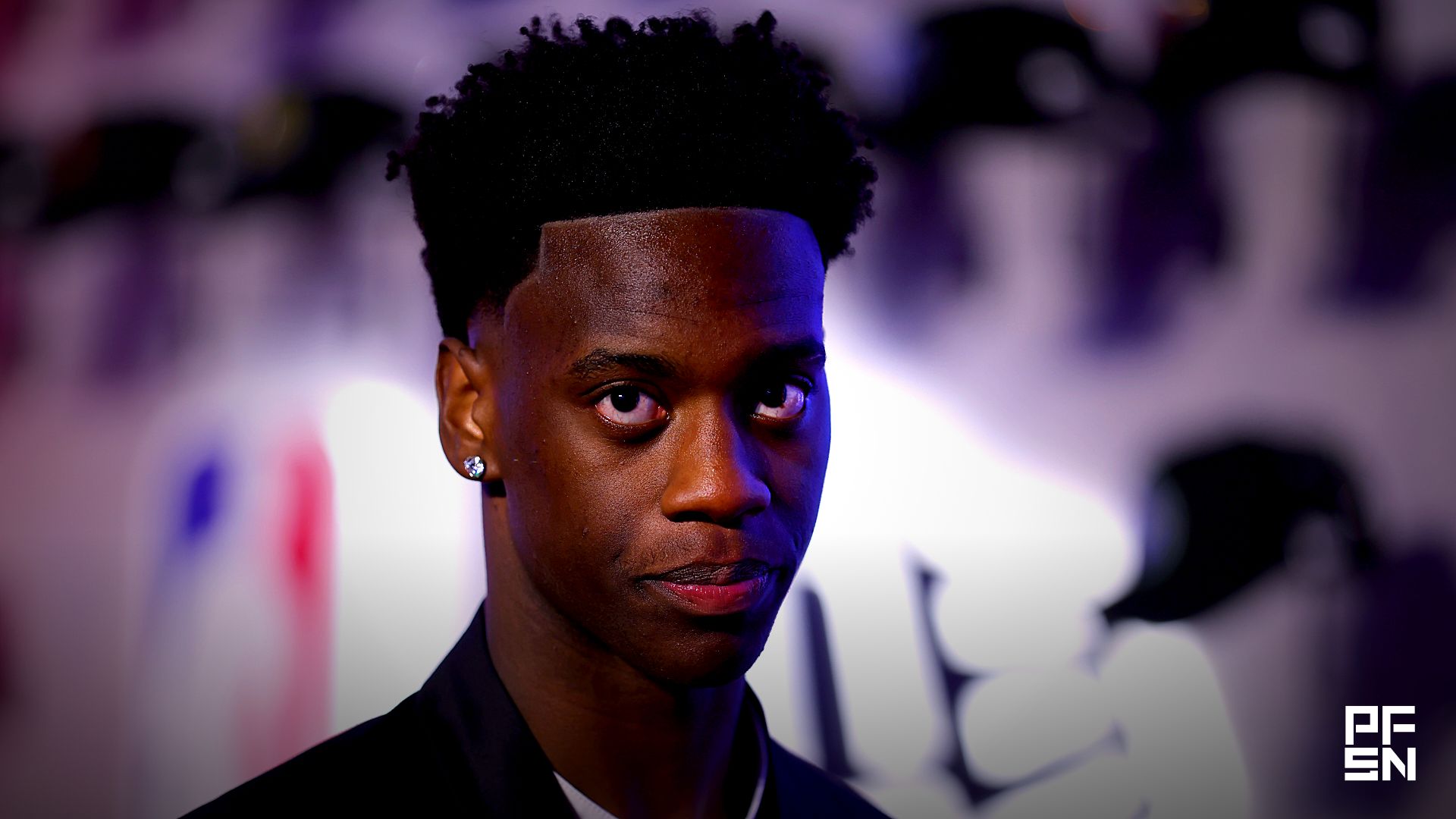 Draft prospect AJ Dybantsa poses for photos on the red carpet before the 2026 NBA draft at Barclays Center.