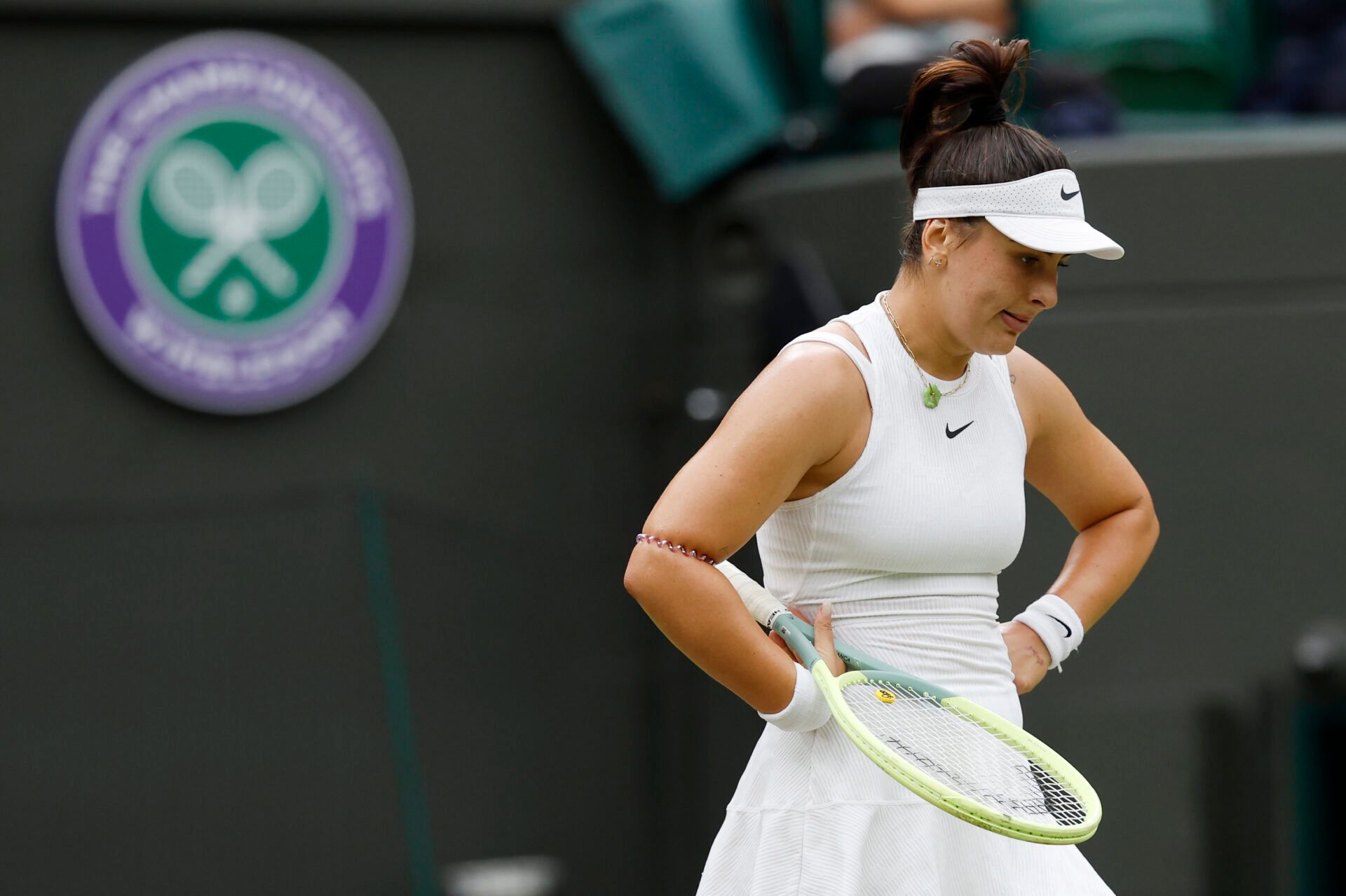 Bianca Andreescu (CAN) reacts after missing a shot against Jasmine Paolini (ITA)(not pictured) in a ladies' singles match on day five of The Championships Wimbledon 2024 at All England Lawn Tennis and Croquet Club.