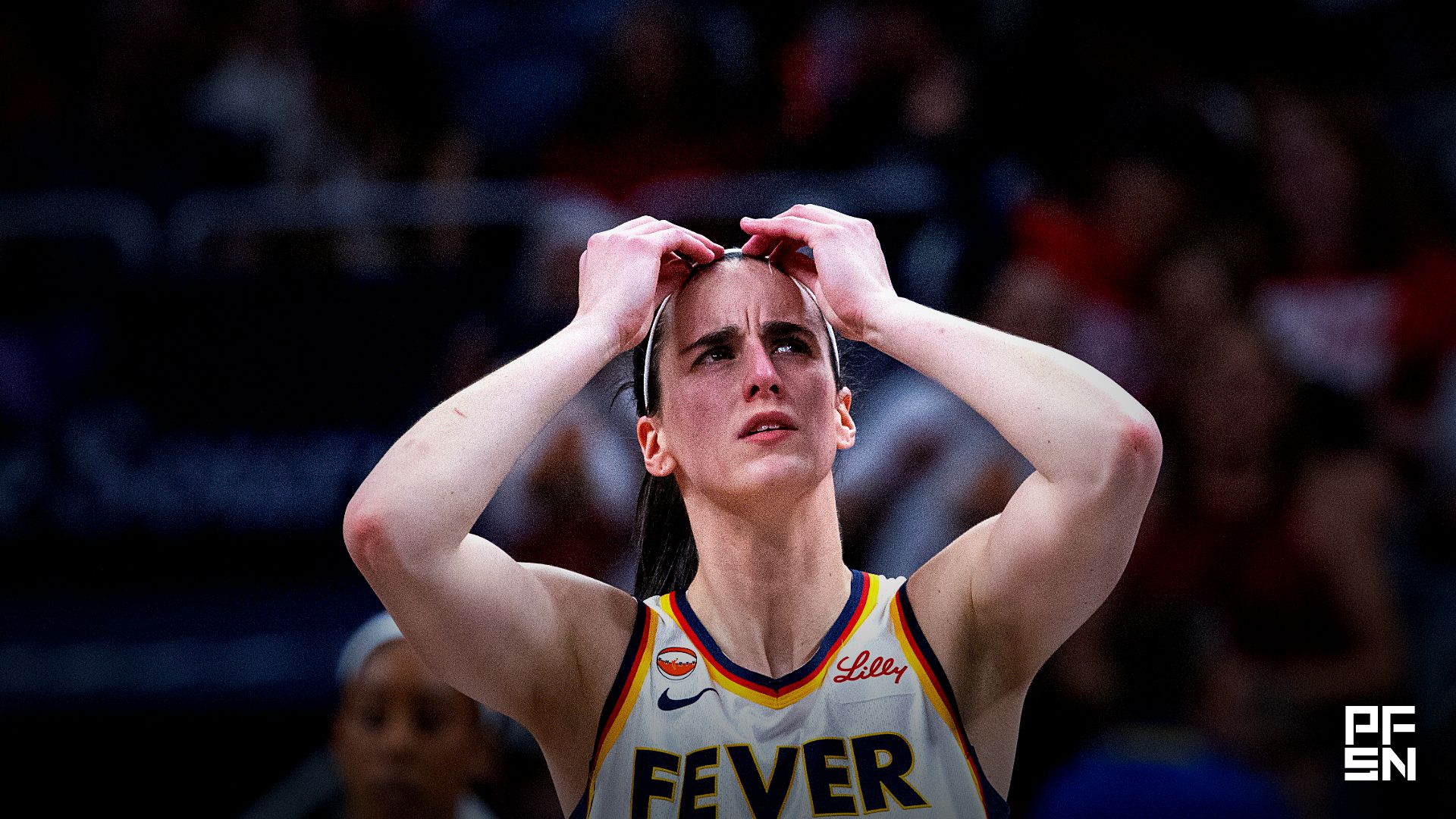 Indiana Fever guard Caitlin Clark (22) reacts in the first half against the Phoenix Mercury at Gainbridge Fieldhouse.