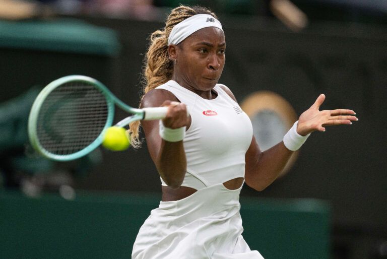 Coco Gauff of the United States returns a shot during her match against Emma Navarro of the United States (not shown) on day seven of The Championships at All England Lawn Tennis and Croquet Club.