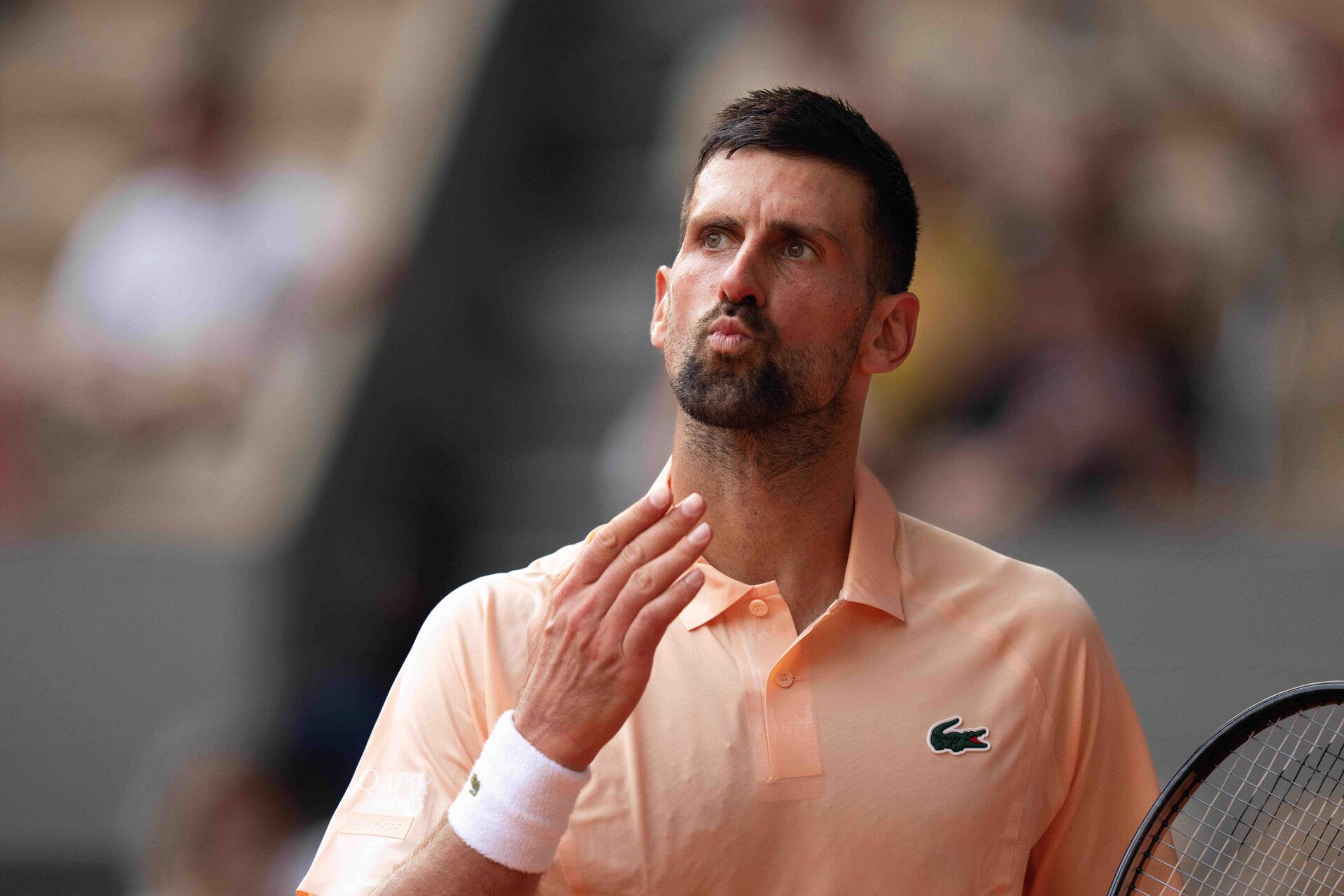Novak Djokovic of Serbia reacts during his match against Joao Fonseca of Brazil on day six at Stade Roland Garros.