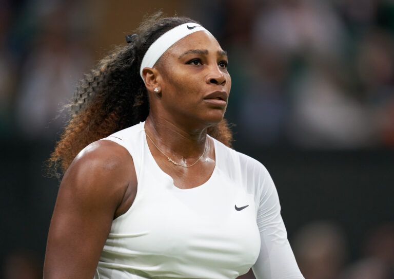 Serena Williams (USA) reacts while playing Aliaksandra Sasnovich (BLR) in first round ladies singles on centre court at All England Lawn Tennis and Croquet Club.