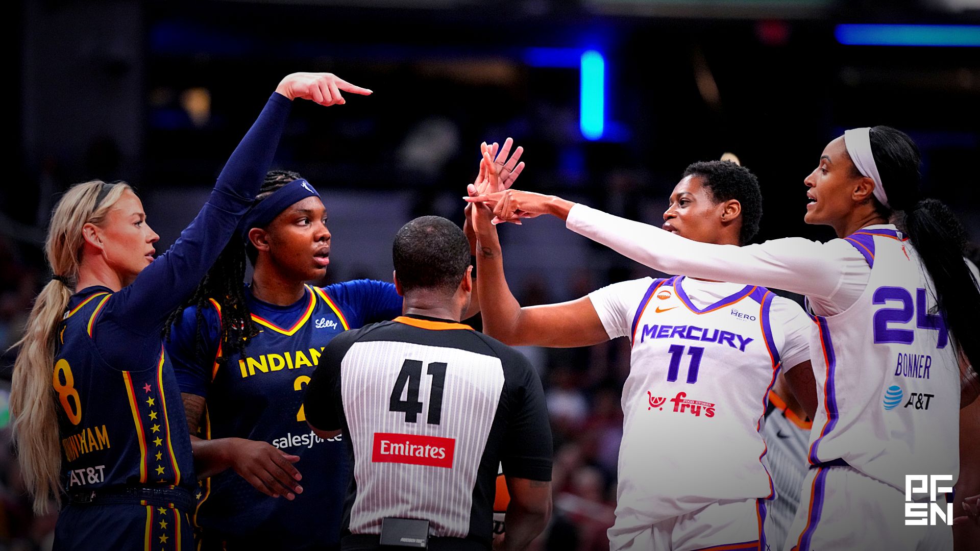 Indiana Fever guard Sophie Cunningham (8) points at Phoenix Mercury forward-guard DeWanna Bonner (24) as an argument broke out between the two players on Monday, June 22, 2026, during the game at Gainbridge Fieldhouse in Indianapolis. The Indiana Fever defeated the Phoenix Mercury, 86-77.