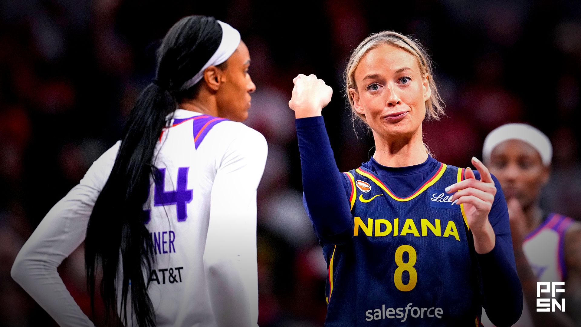 Indiana Fever guard Sophie Cunningham (8) points to Phoenix Mercury forward-guard DeWanna Bonner (24) after an argument between the two on Monday, June 22, 2026, during the game at Gainbridge Fieldhouse in Indianapolis. The Indiana Fever defeated the Phoenix Mercury, 86-77.