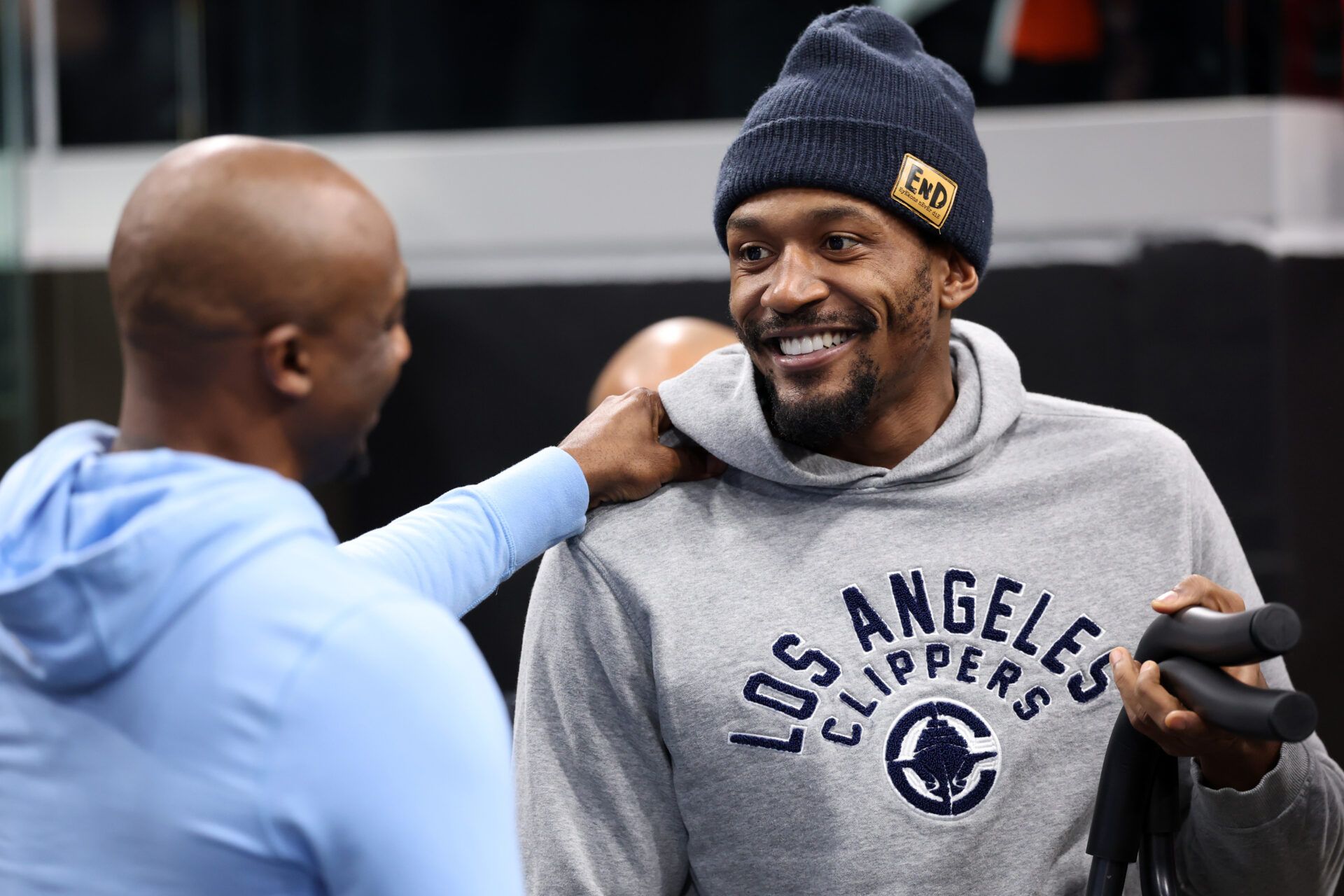 Los Angeles Clippers guard Bradley Beal (right) chats with Utah Jazz assistant coach Jason Terry prior to an NBA game at Intuit Dome.