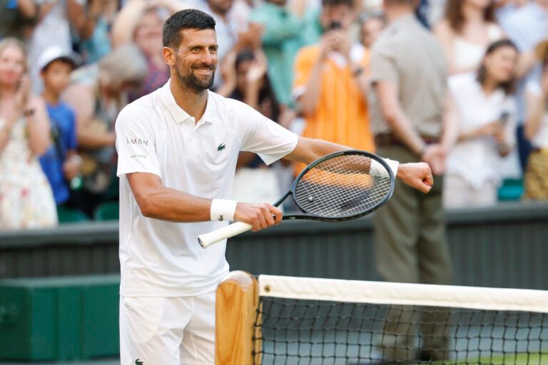 Novak Djokovic (SRB) dances on the court towards his daughter in the player's box after his match against Flavio Cobolli (ITA)(not pictured) in a gentlemen's singles quarter-final on day ten of these Championships Wimbledon 2025 at All England Lawn Tennis and Croquet Club.