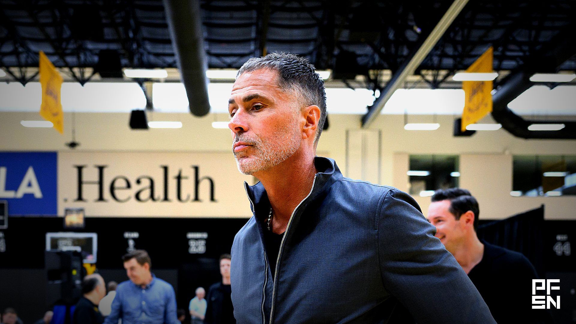 Los Angeles Lakers general manager Rob Pelinka leaves a press conference to preview the 2025-26 season at UCLA Health Training Center.