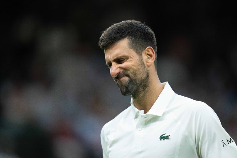 Novak Djokovic of Serbia reacts during his match against Stefanos Tsitsipas of Greece on day three at All England Lawn Tennis and Croquet Club.