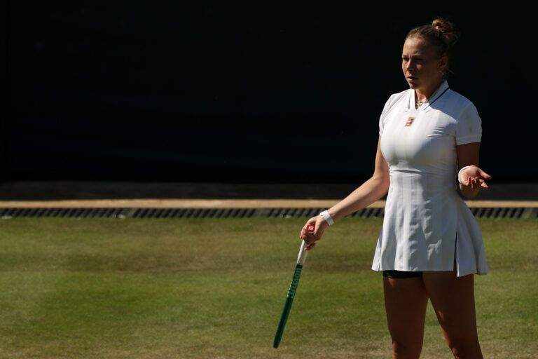Amanda Anisimova (USA) gestures after a point against Sofia Kenin (USA) (not pictured) on day four of The Championships Wimbledon 2026 at All England Lawn Tennis and Croquet Club.