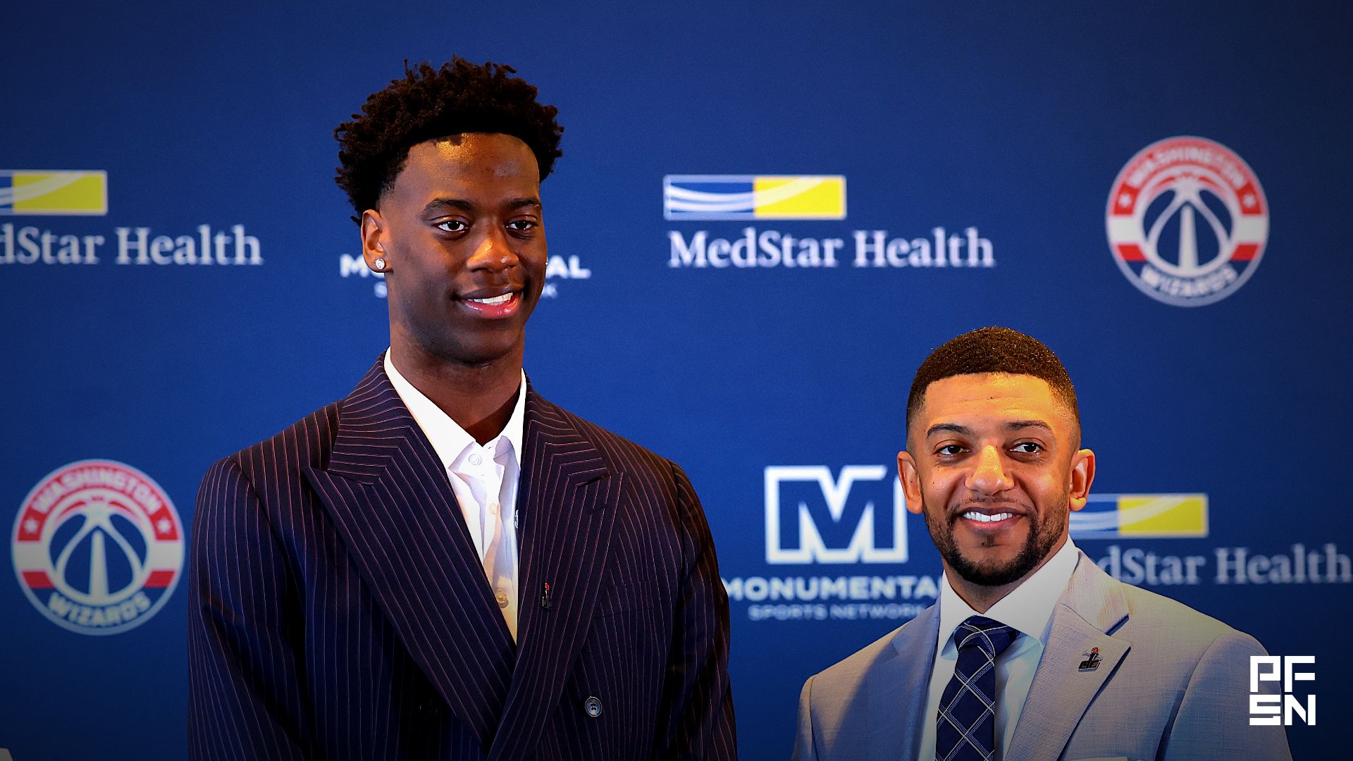 Washington Wizards first round draft pick and number one overall pick AJ Dybantsa (left) poses for a photo with Wizards general manager Will Dawkins (right) during a press conference at InterContinental Hotel.
