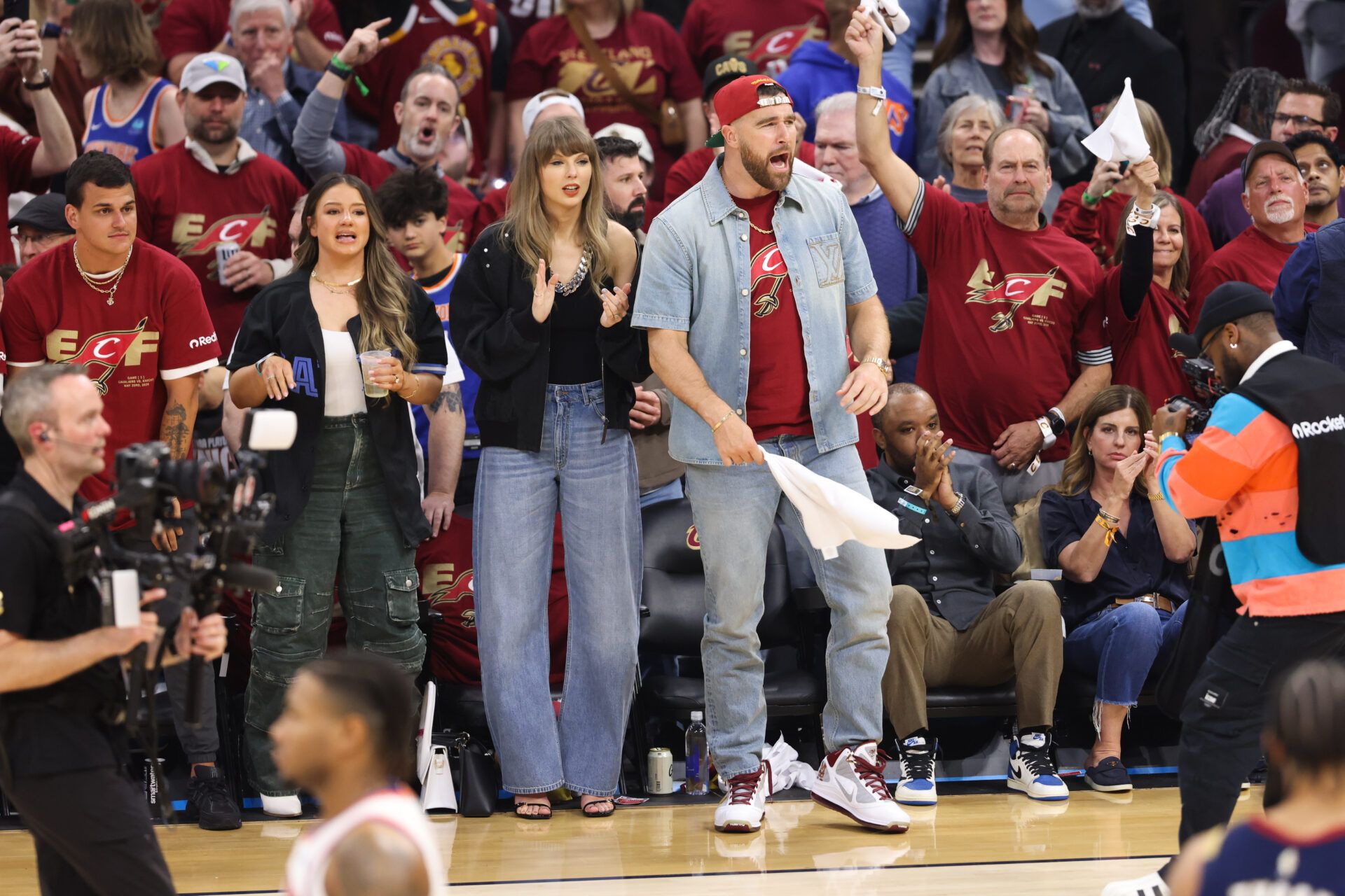 Taylor Swift and Travis Kelce react during game three of the eastern conference finals for the 2026 NBA playoffs between the New York Knicks and Cleveland Cavaliers at Rocket Arena.