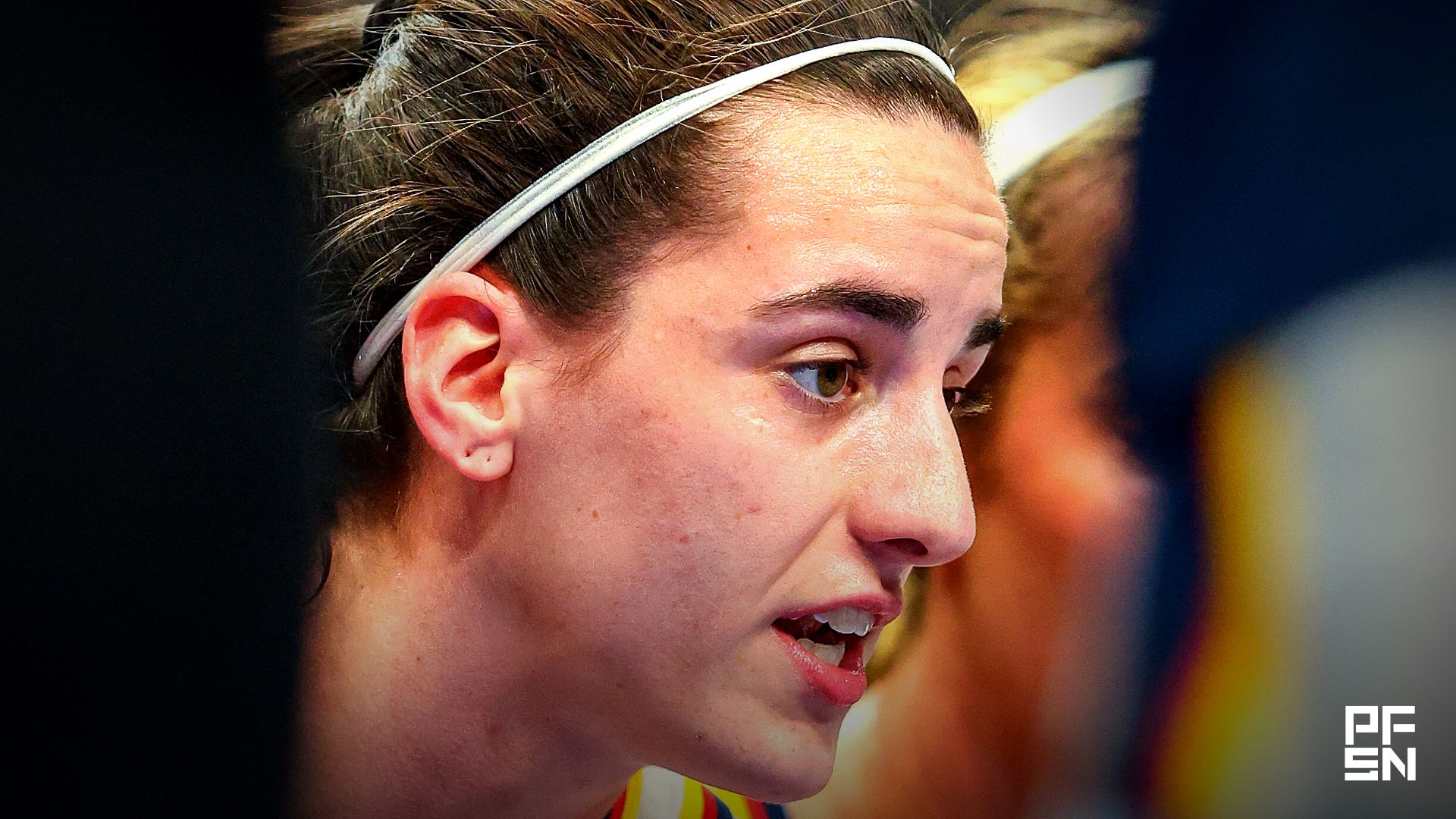 Indiana Fever guard Caitlin Clark (22) looks on during a time out during the game against the Atlanta Dream during the first quarter at State Farm Arena.