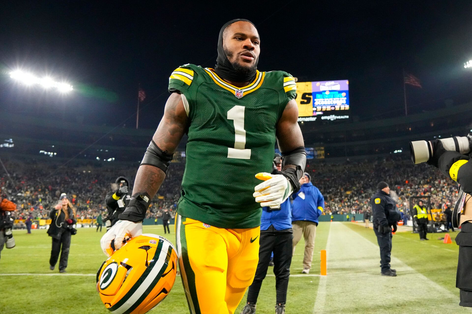 Green Bay Packers defensive end Micah Parsons (1) jogs off the field following the game against the Chicago Bears at Lambeau Field.