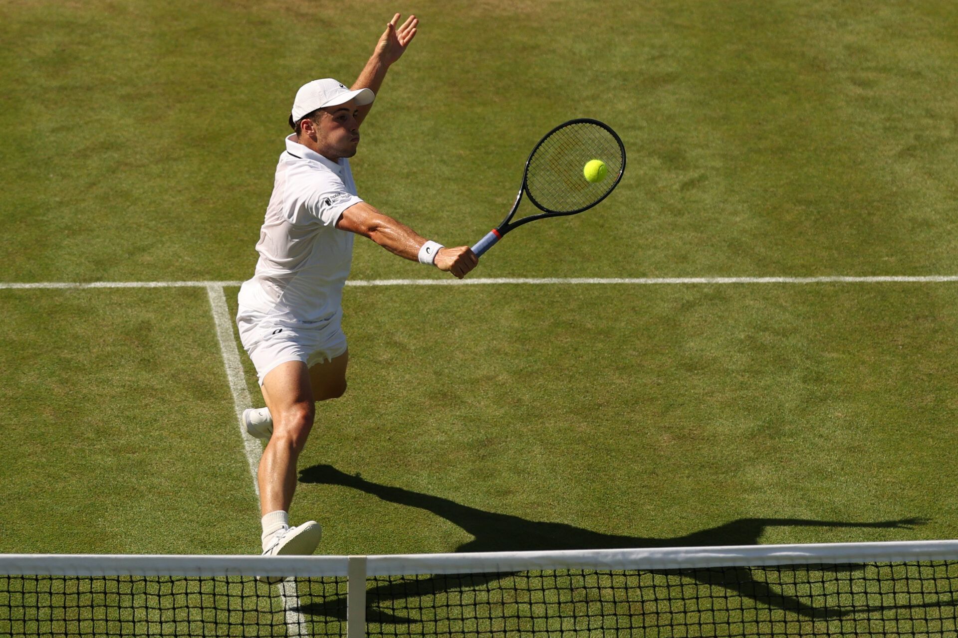 Arthur Fery (GBR) hits a volley against Zizou Bergs (GER) (not pictured) on day six of The Championships Wimbledon 2026 at All England Lawn Tennis and Croquet Club.