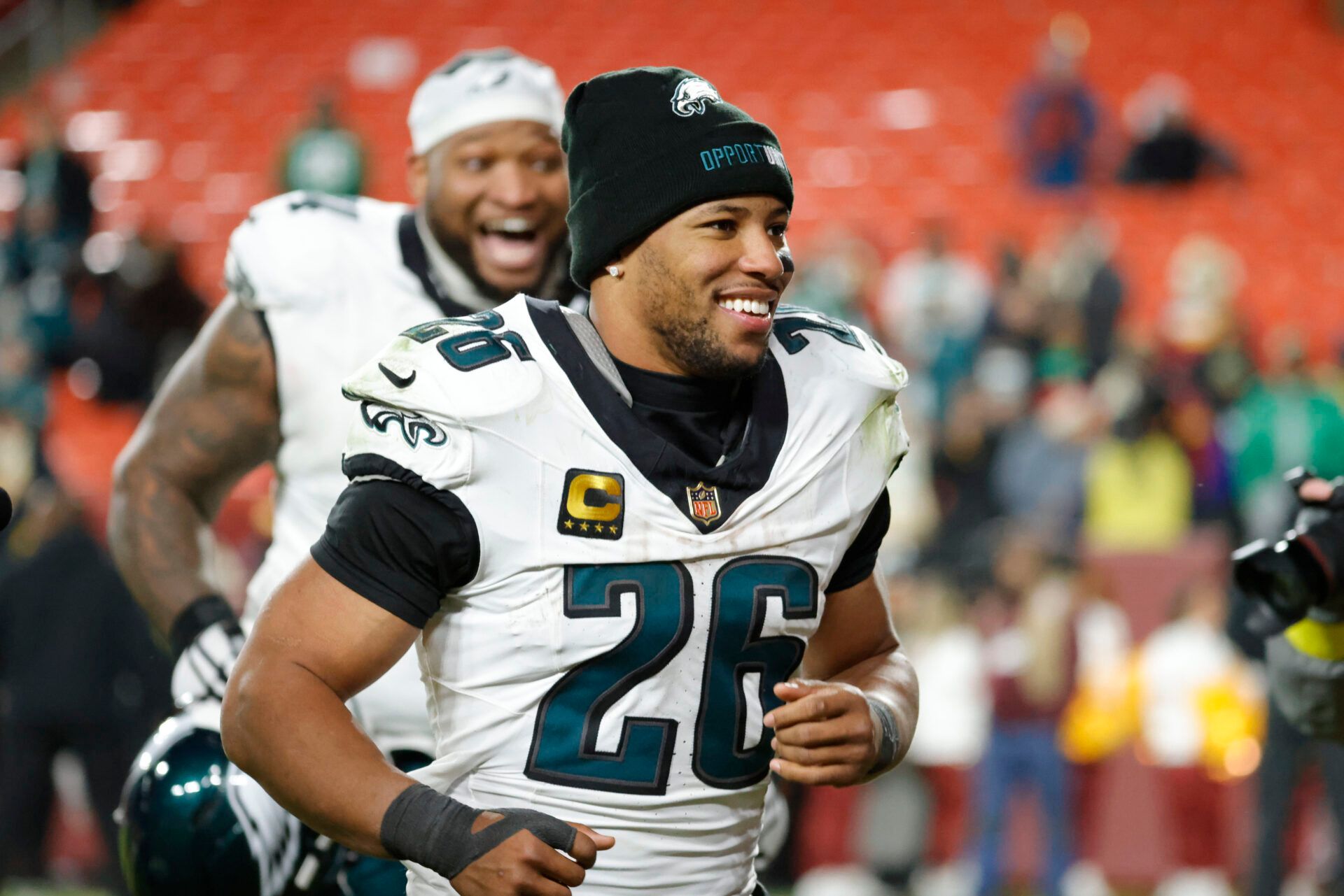 Philadelphia Eagles running back Saquon Barkley (26) runs off the field after the game against the Washington Commanders at Northwest Stadium.