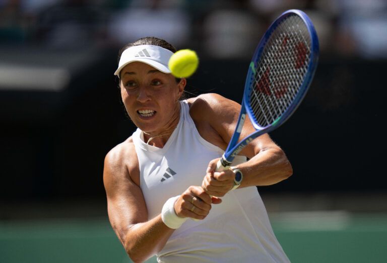 Jessica Pegula of the United States returns a shot during  her match against Iva Jovic of the United States on day seven at All England Lawn Tennis and Croquet Club.