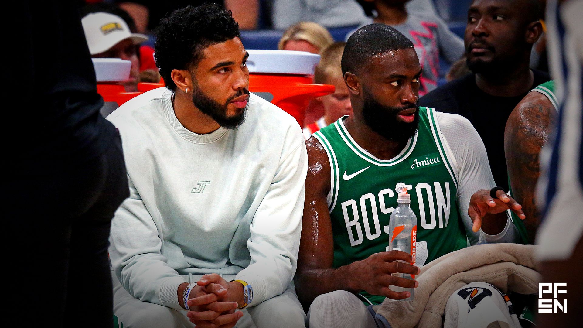 Boston Celtics forward Jayson Tatum (0) and guard Jaylen Brown (7) look on from the bench during the second quarter against the Memphis Grizzlies at FedExForum.