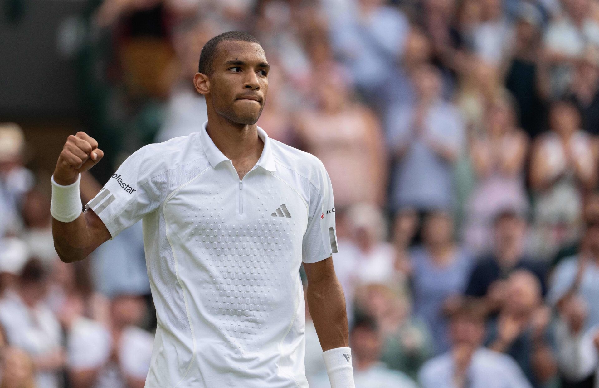 Felix Auger-Aliassime of Canada celebrates winning match against Alejandro Davidovich Fokina of Spain on day seven at All England Lawn Tennis and Croquet Club.