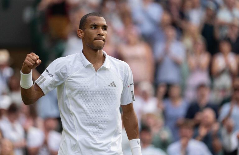 Felix Auger-Aliassime of Canada celebrates winning match against Alejandro Davidovich Fokina of Spain on day seven at All England Lawn Tennis and Croquet Club.