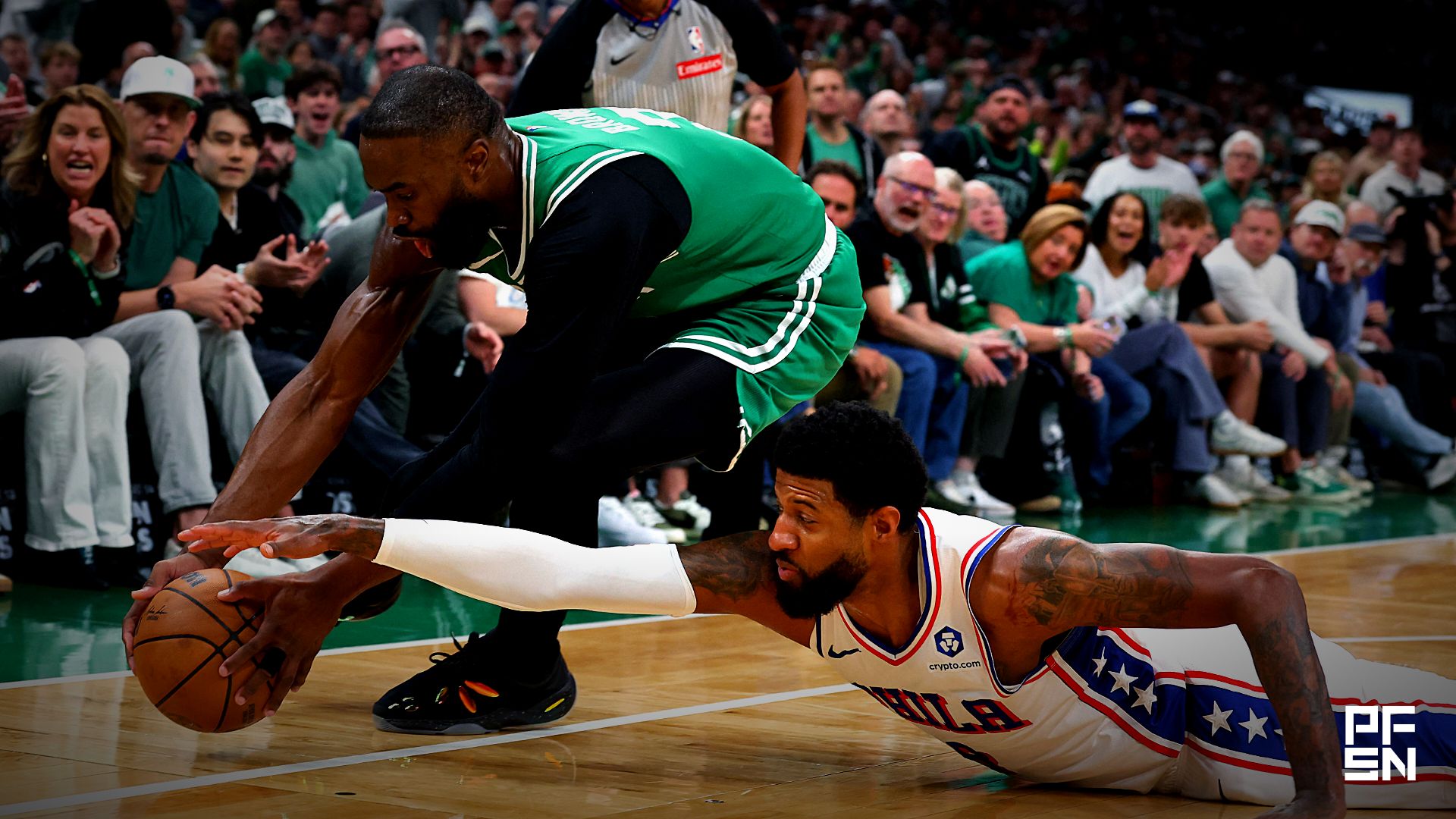 Philadelphia 76ers forward Paul George (8) goes for a loose ball with Boston Celtics guard Jaylen Brown (7) during the first quarter of game seven of the first round of the 2026 NBA Playoffs at TD Garden.