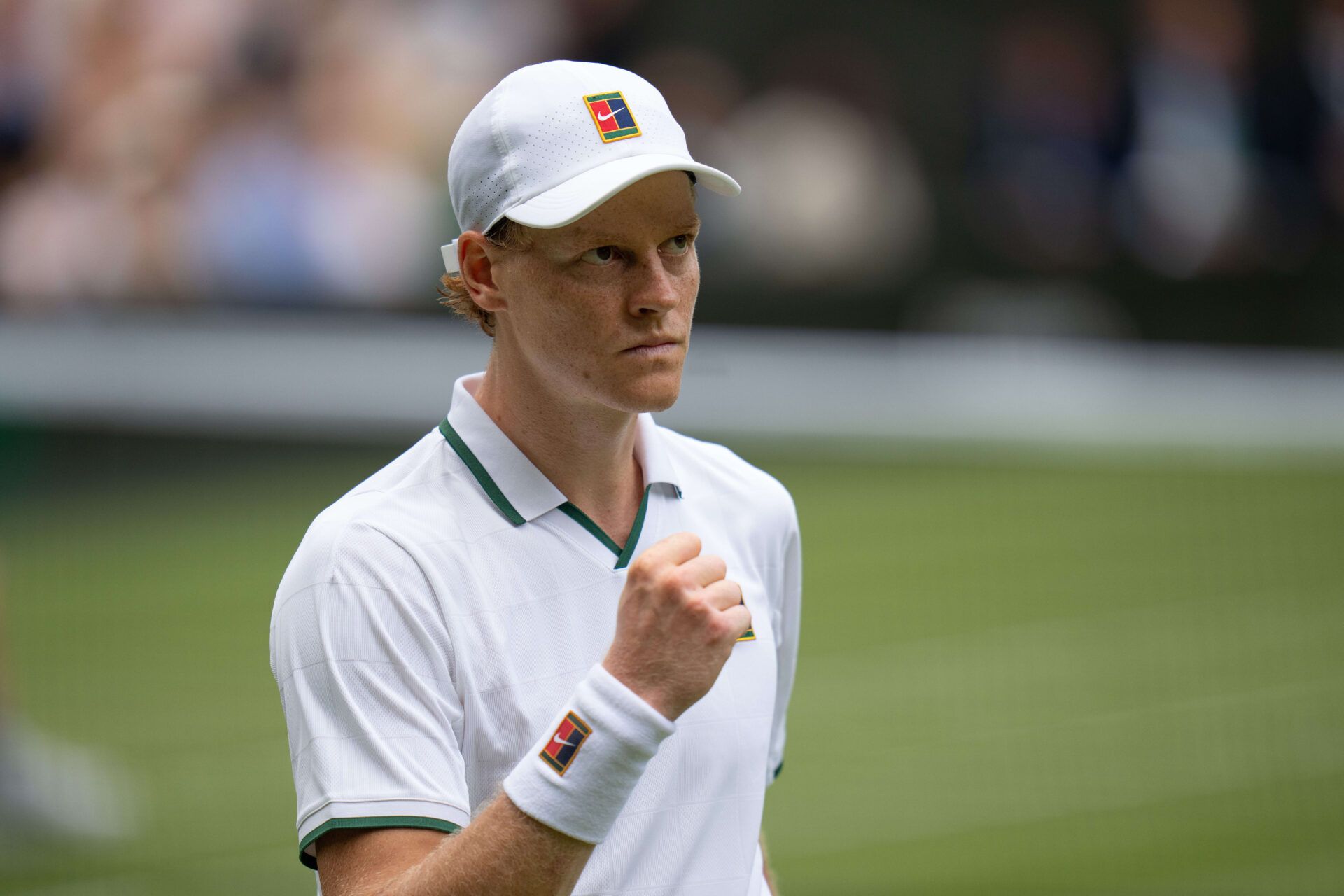 Jannik Sinner of Italy reacts during his match against Nuno Borges of Portugal on day three at All England Lawn Tennis and Croquet Club.