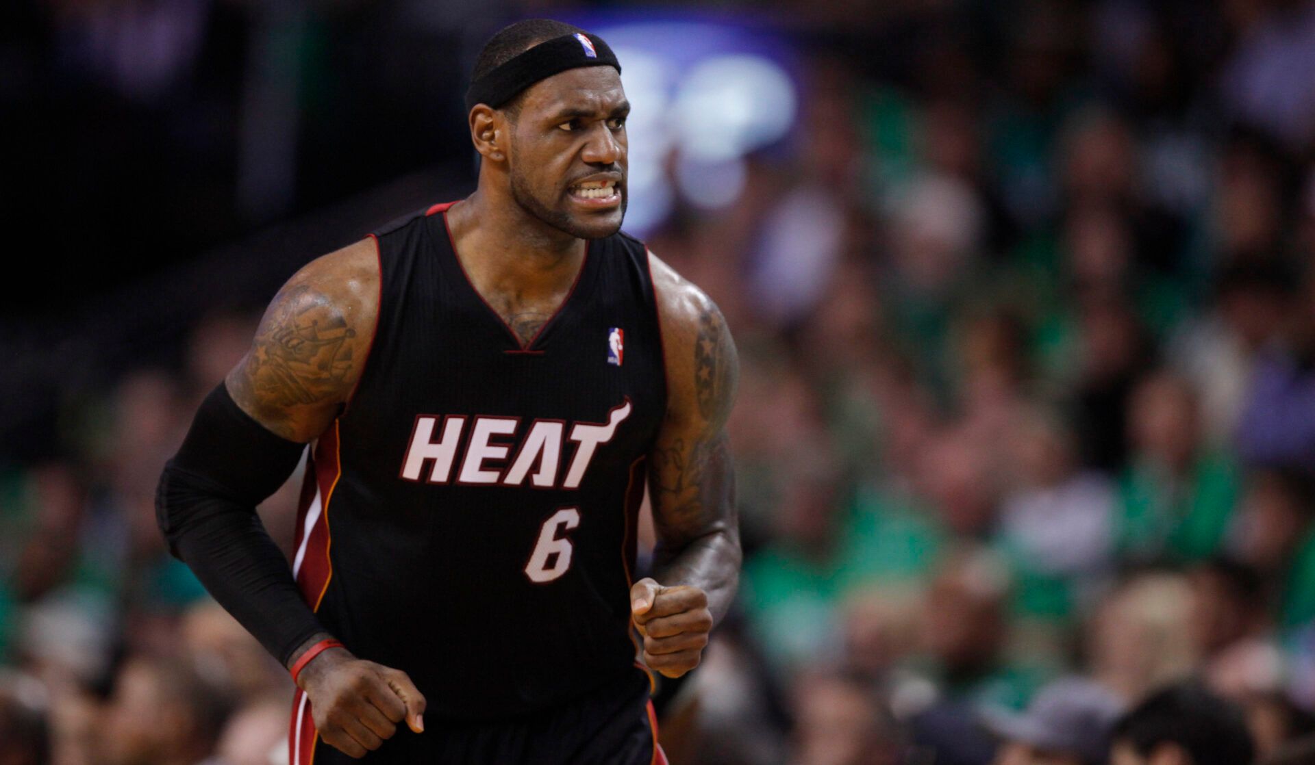 Miami Heat small forward LeBron James (6) reacts to a play as he returns up court during the second half against the Boston Celtics at the TD Garden. The Celtics defeated Miami 88-80.