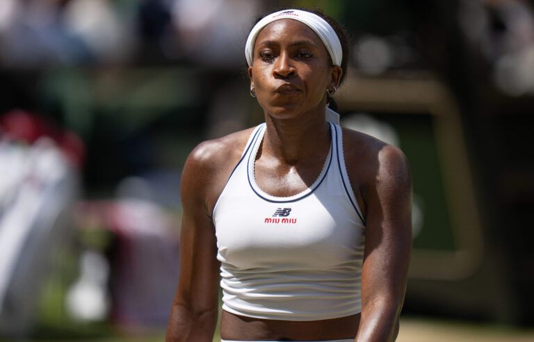 Coco Gauff of the United States reacts during her match against Jessica Pegula of the United States on day nine at All England Lawn Tennis and Croquet Club.