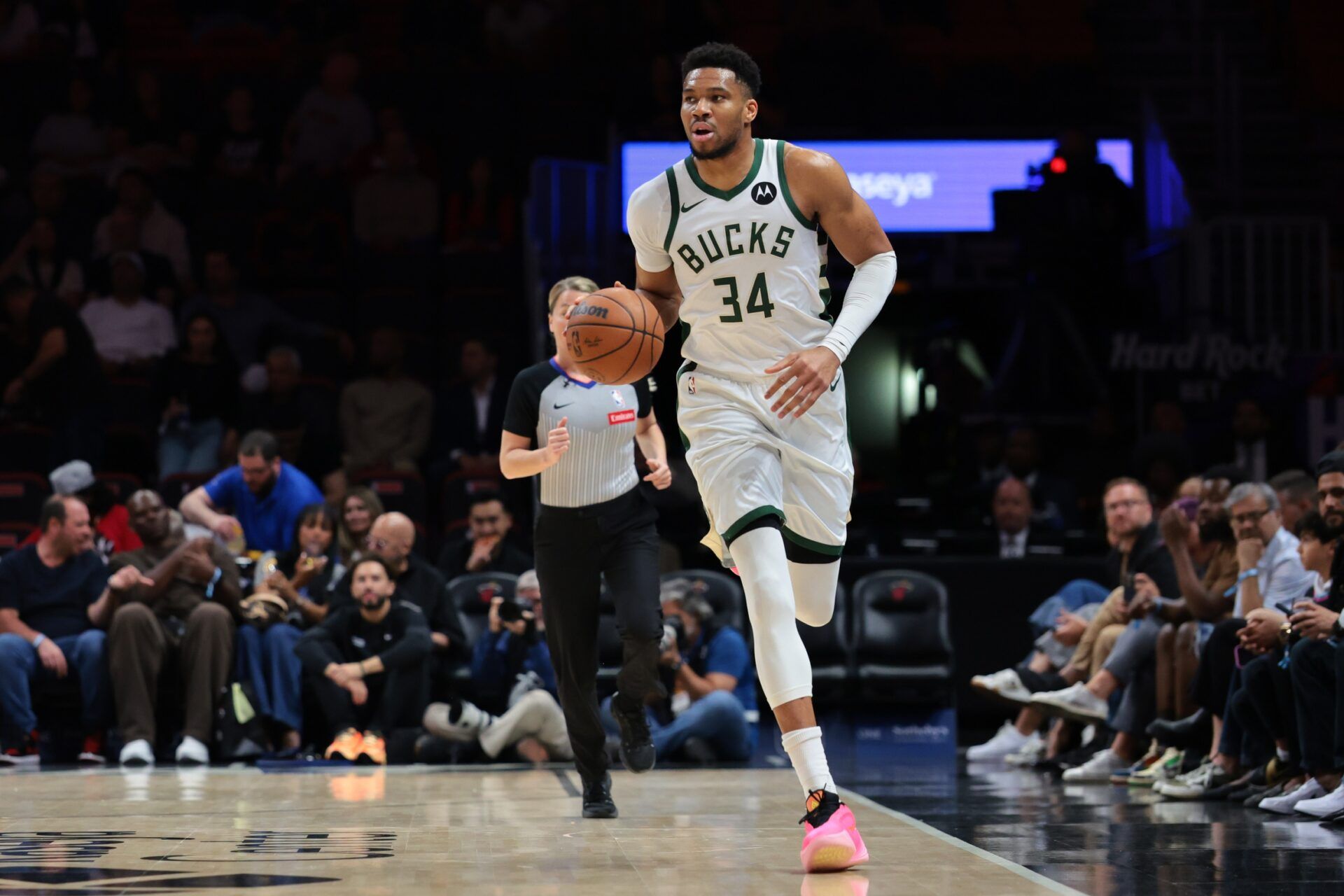 Milwaukee Bucks forward Giannis Antetokounmpo (34) dribbles the basketball against the Miami Heat during the first quarter at Kaseya Center.