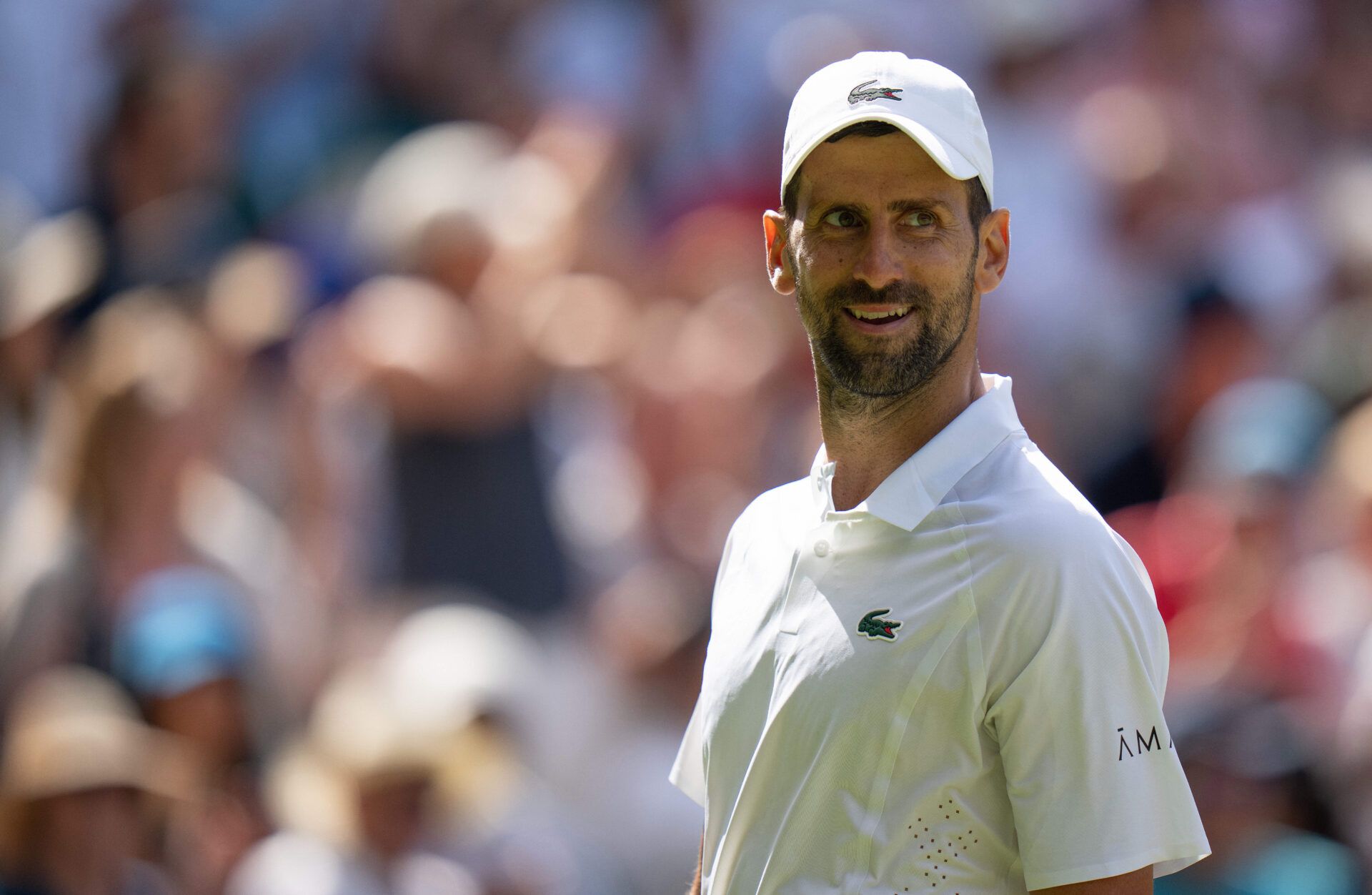 Novak Djokovic of Serbia during his match against Arthur Rinderknech of France on day five at All England Lawn Tennis and Croquet Club.