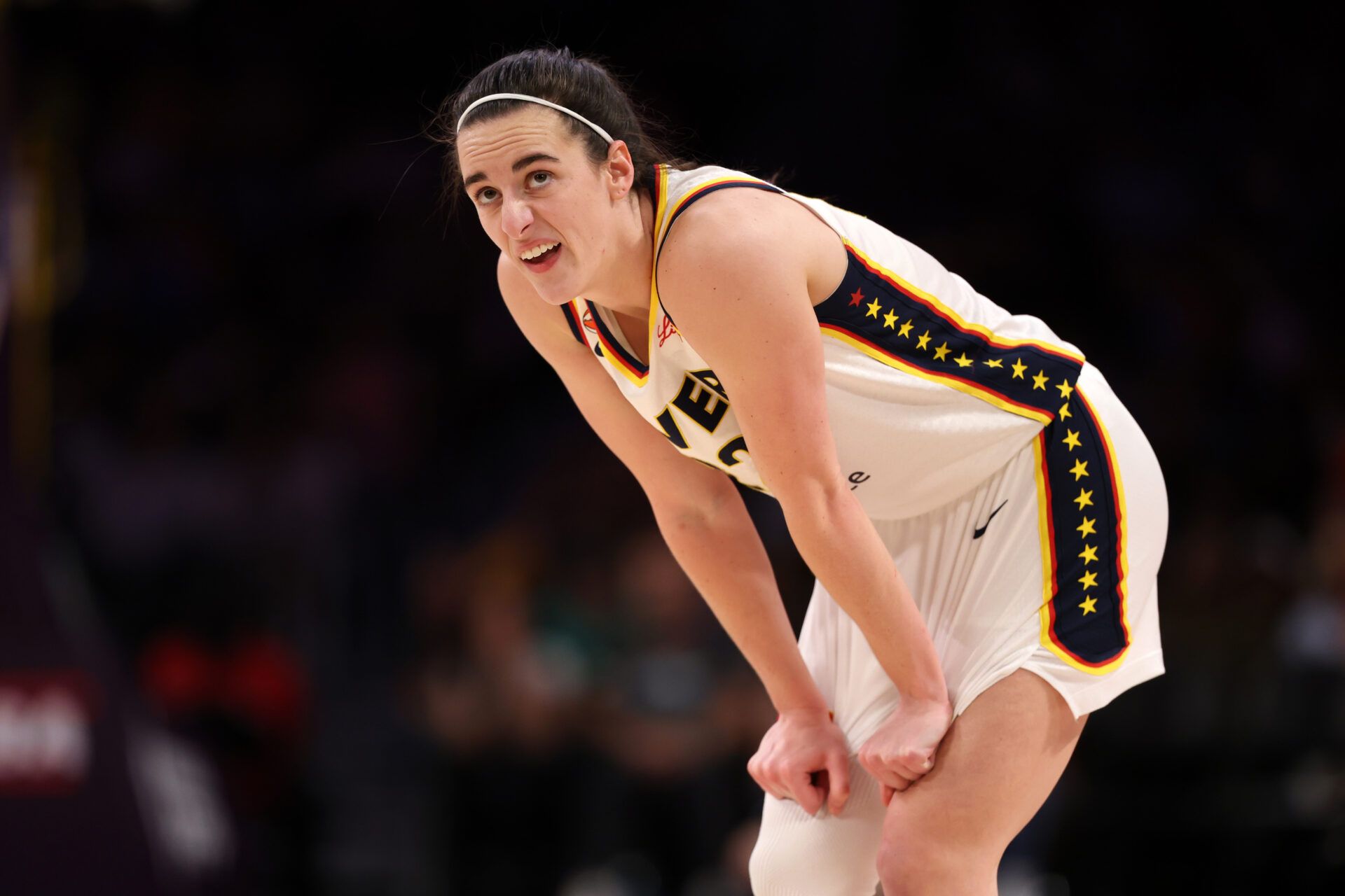 Indiana Fever guard Caitlin Clark (22) reacts to a play during the fourth quarter against the Los Angeles Sparks at Crypto.com Arena.