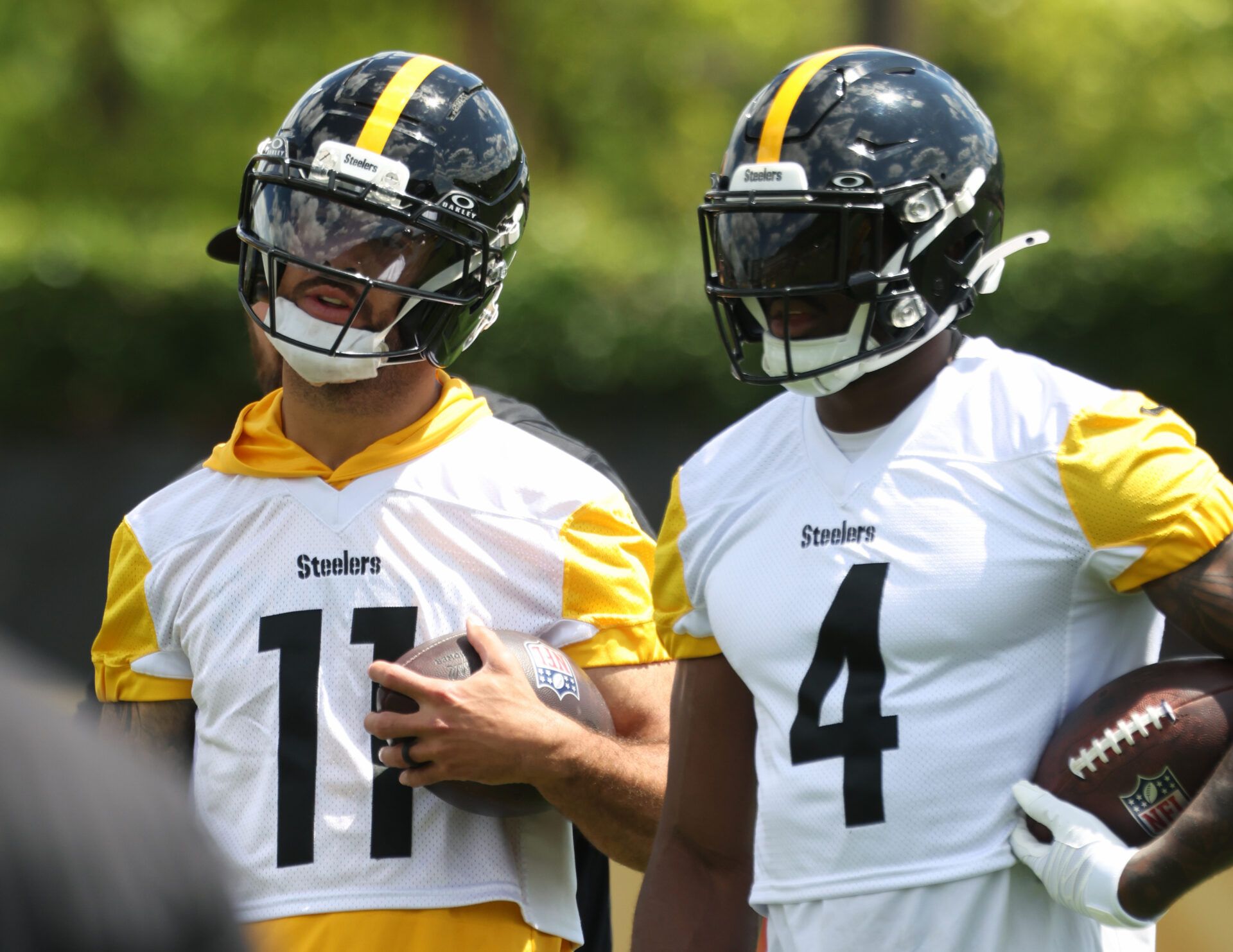 Pittsburgh Steelers wide receiver Michael Pittman Jr. (11) and DK Metcalf (4) participate in OTA  drills at the UPMC Rooney Sports Complex.