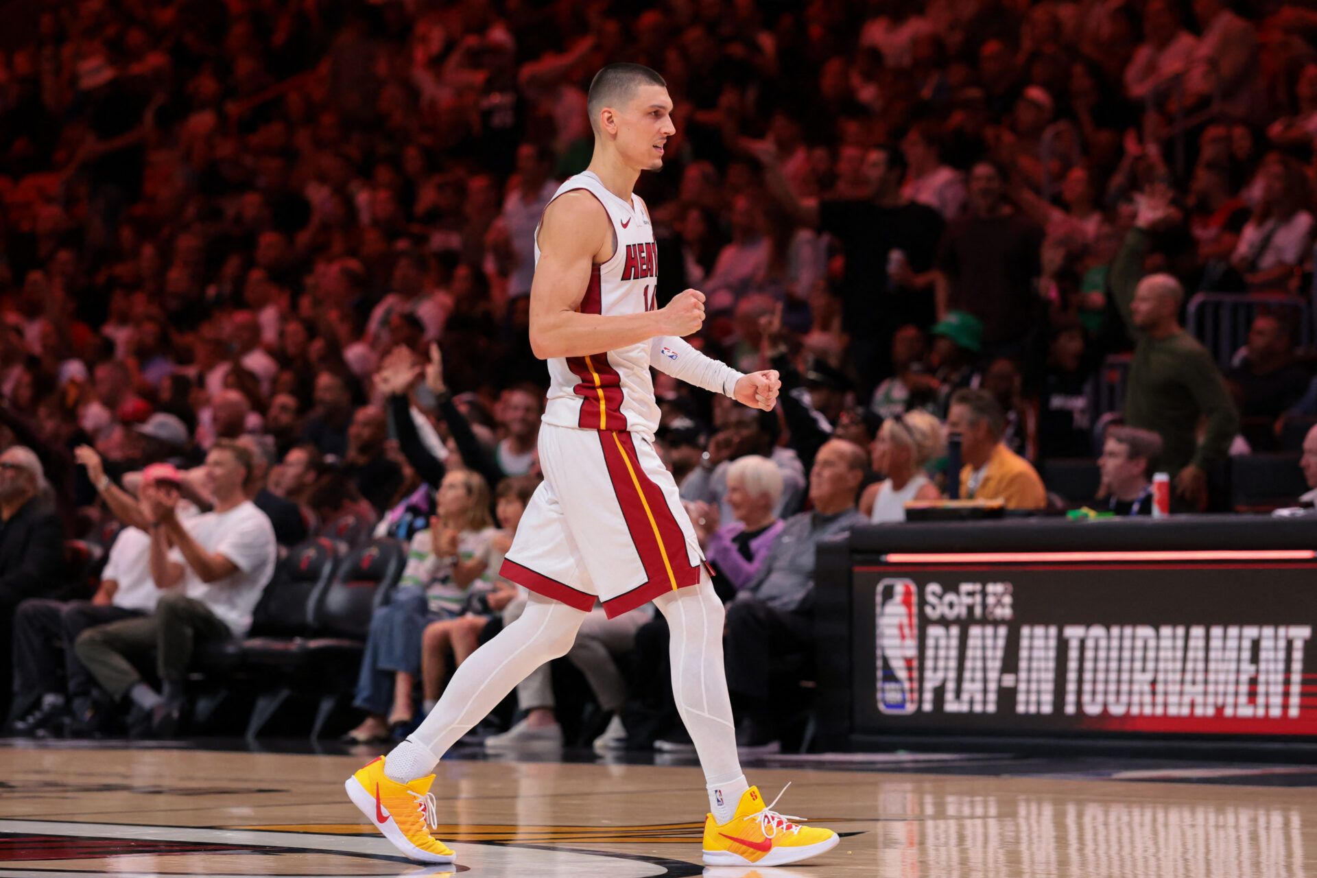 Miami Heat guard Tyler Herro (14) reacts against the Boston Celtics during the third quarter at Kaseya Center.
