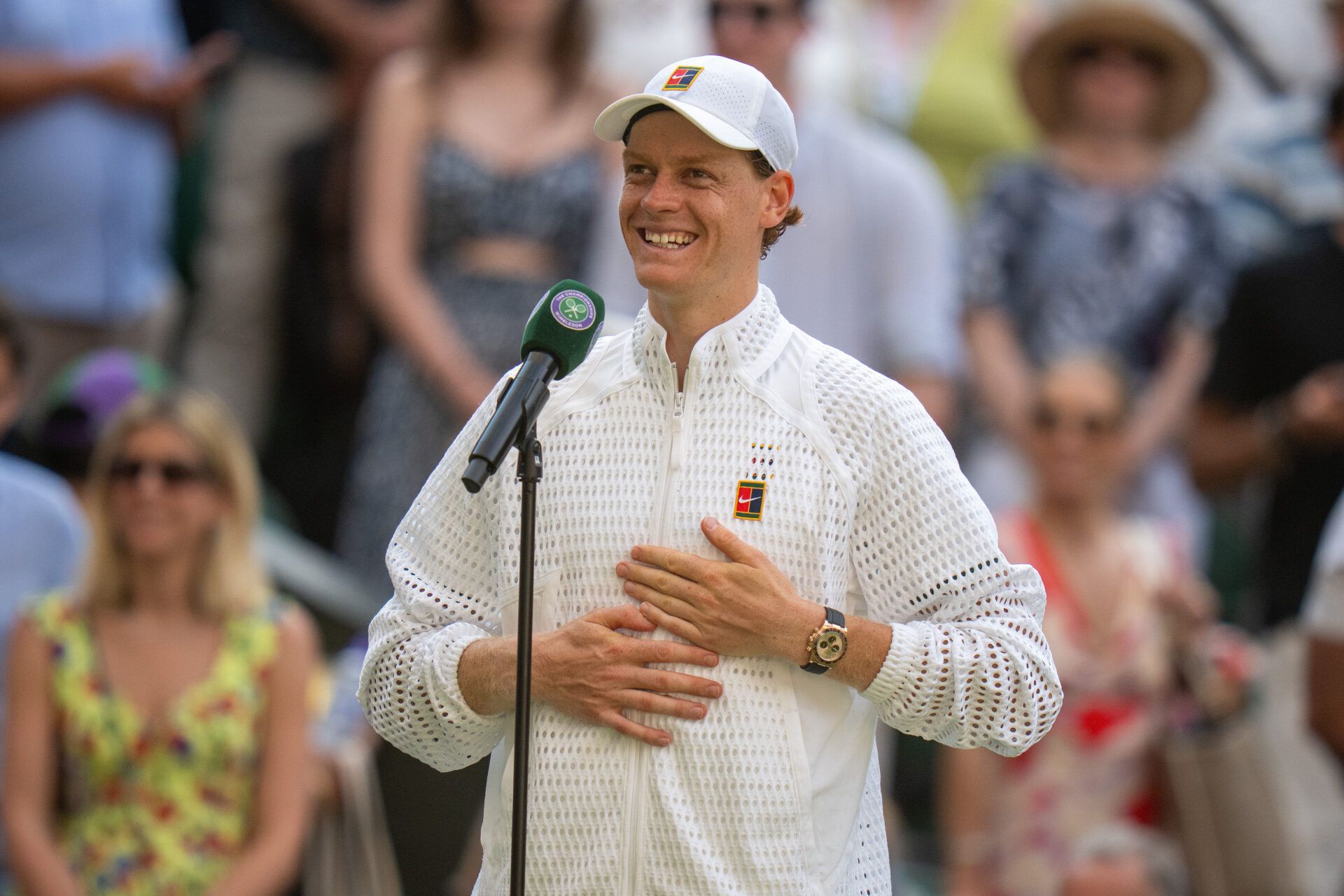 Jannik Sinner of Italy at his on court interview after winning his semifinal match against Novak Djokovic of Serbia on day 12 at All England Lawn Tennis and Croquet Club.