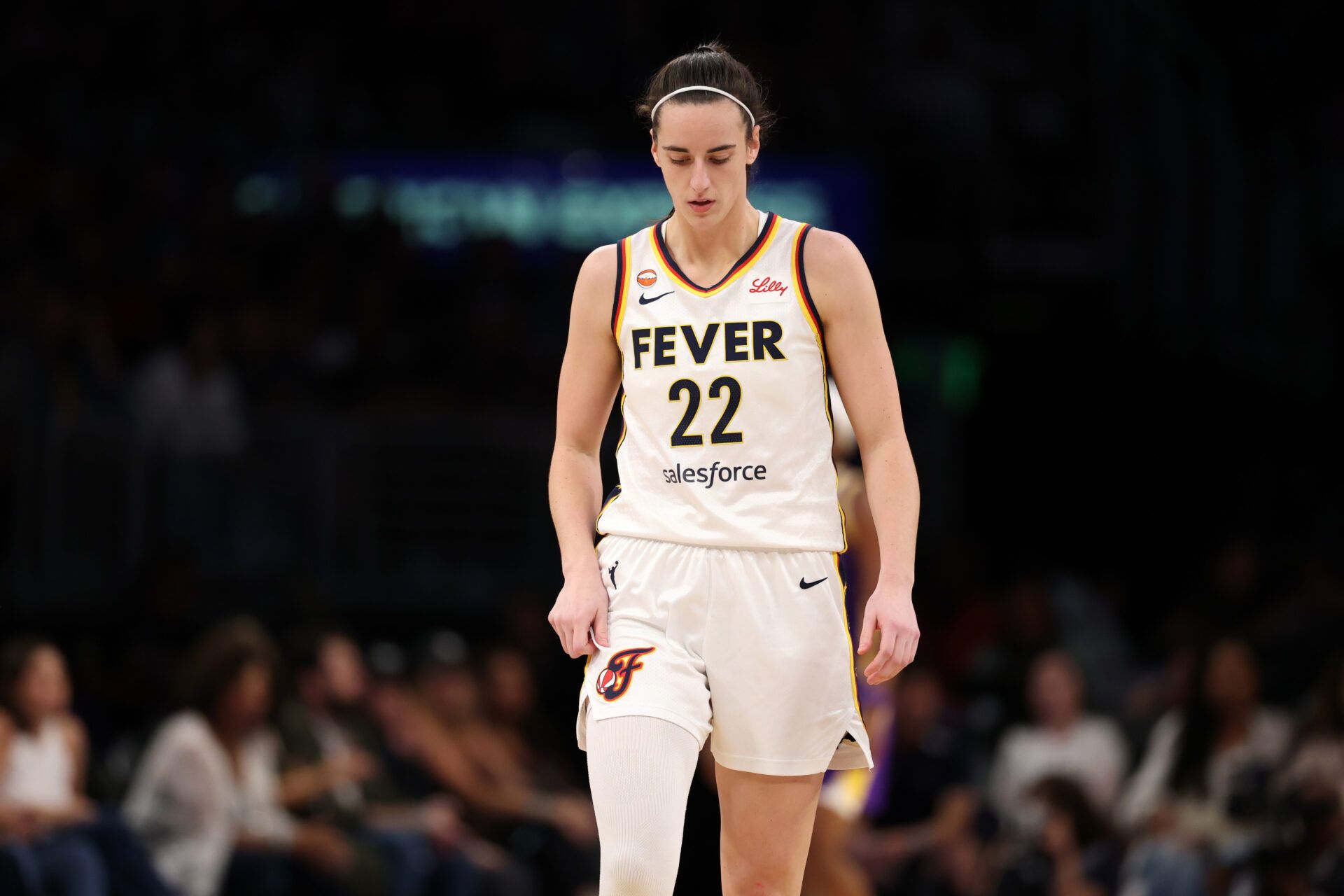 Indiana Fever guard Caitlin Clark (22) reacts to a play during the fourth quarter against the Los Angeles Sparks at Crypto.com Arena.