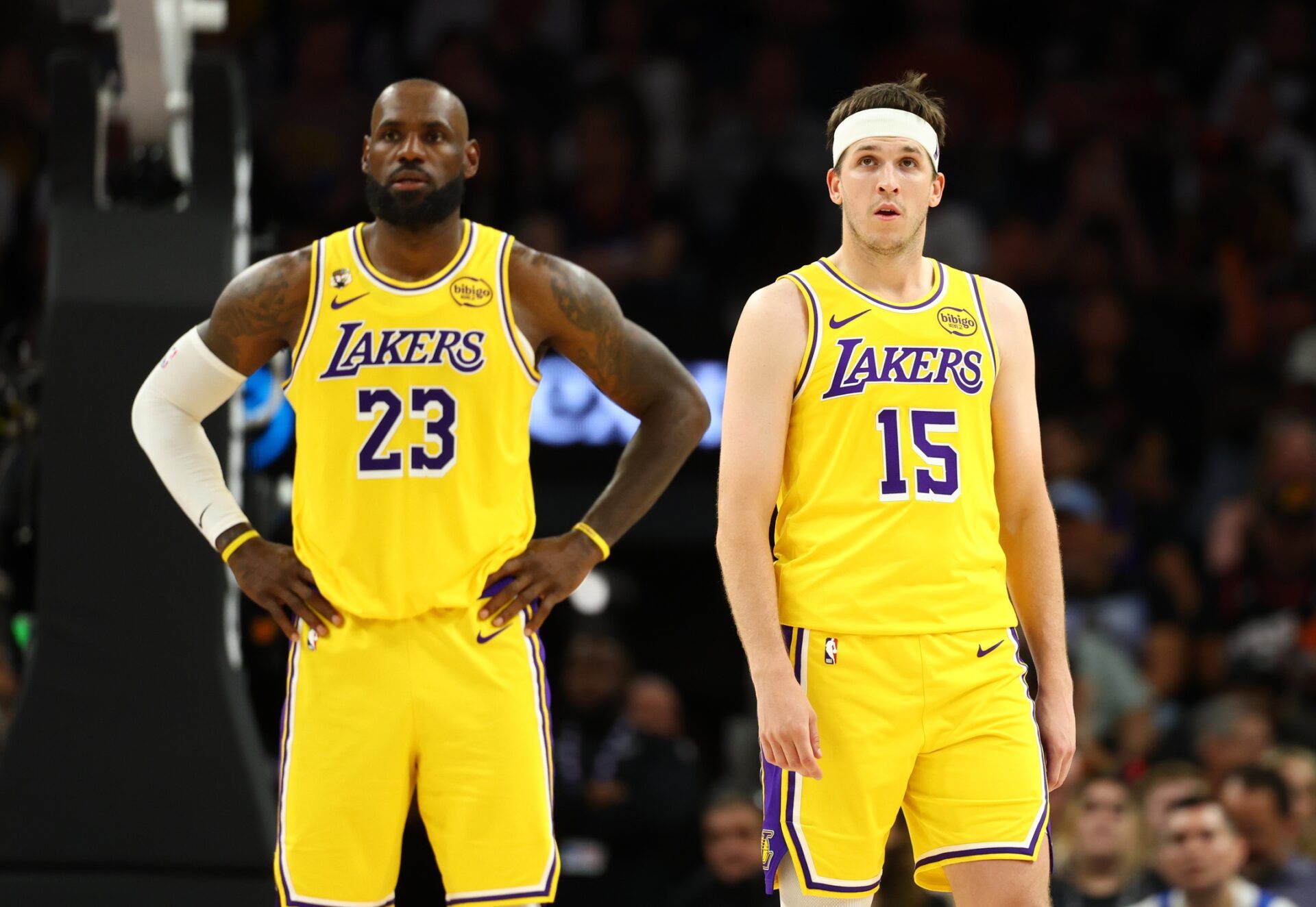 Los Angeles Lakers guard Austin Reaves (15) with forward LeBron James (23) against the Phoenix Suns at Mortgage Matchup Center.