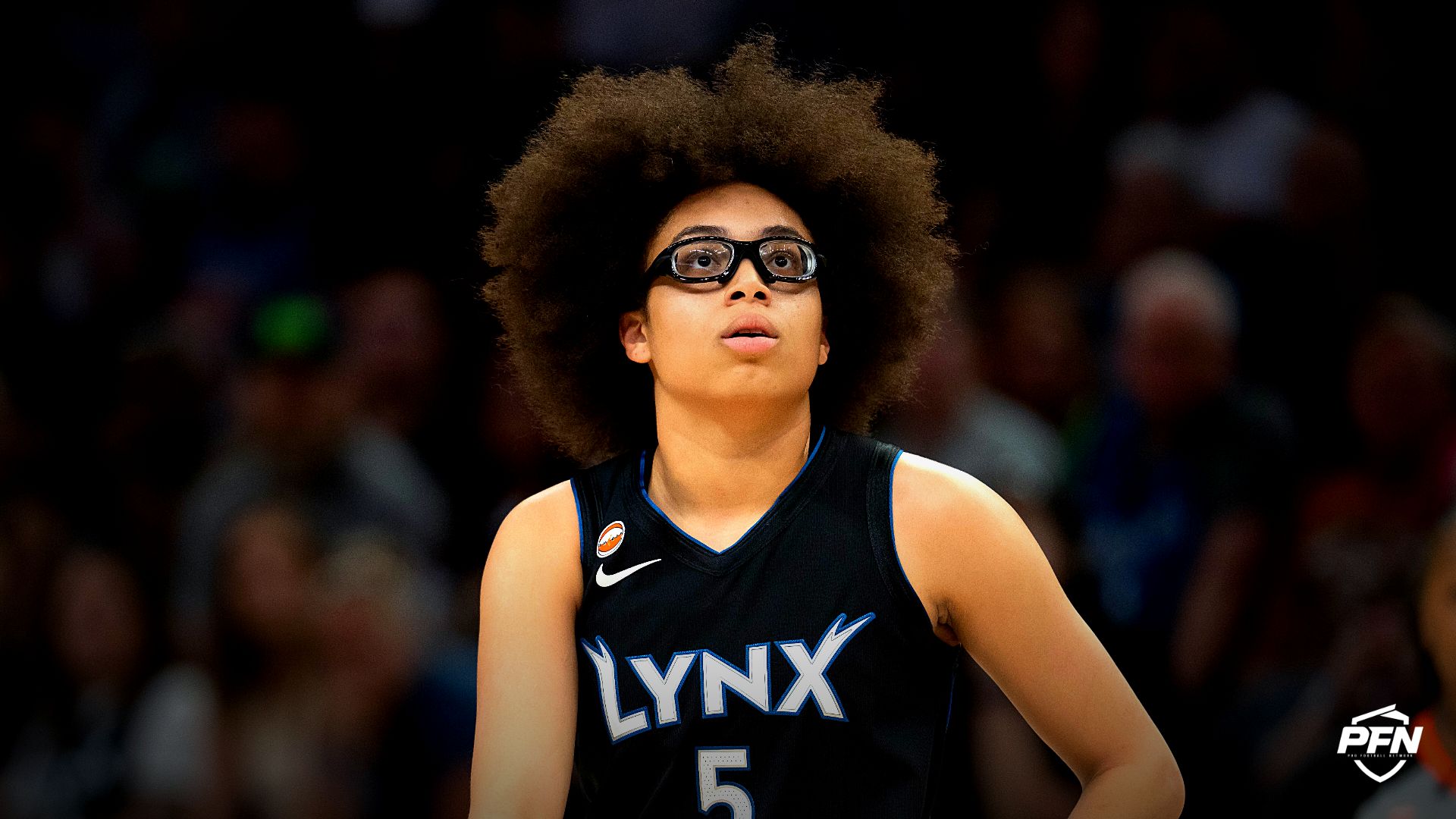 Minnesota Lynx guard Olivia Miles (5) looks on against the Phoenix Mercury in the first half at Target Center.