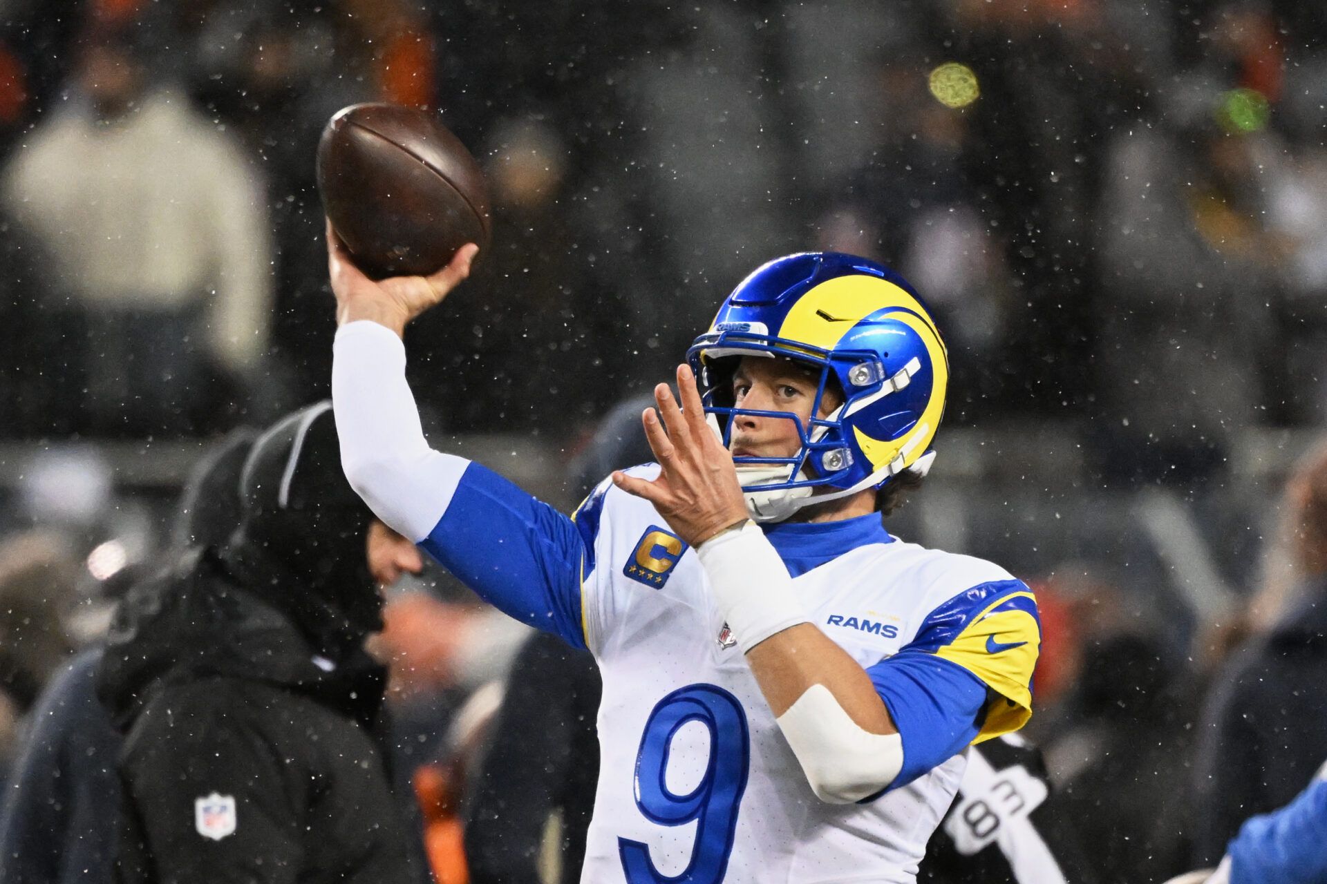 Los Angeles Rams quarterback Matthew Stafford (9) throws a pass during warmups before an NFC Divisional Round game against the Chicago Bears at Soldier Field.
