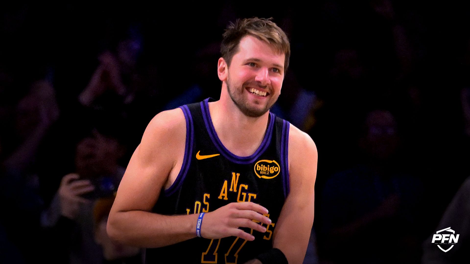 Los Angeles Lakers guard Luka Doncic (77) smiles after a dunk in the final minutes of the game against the Cleveland Cavaliers at Crypto.com Arena.
