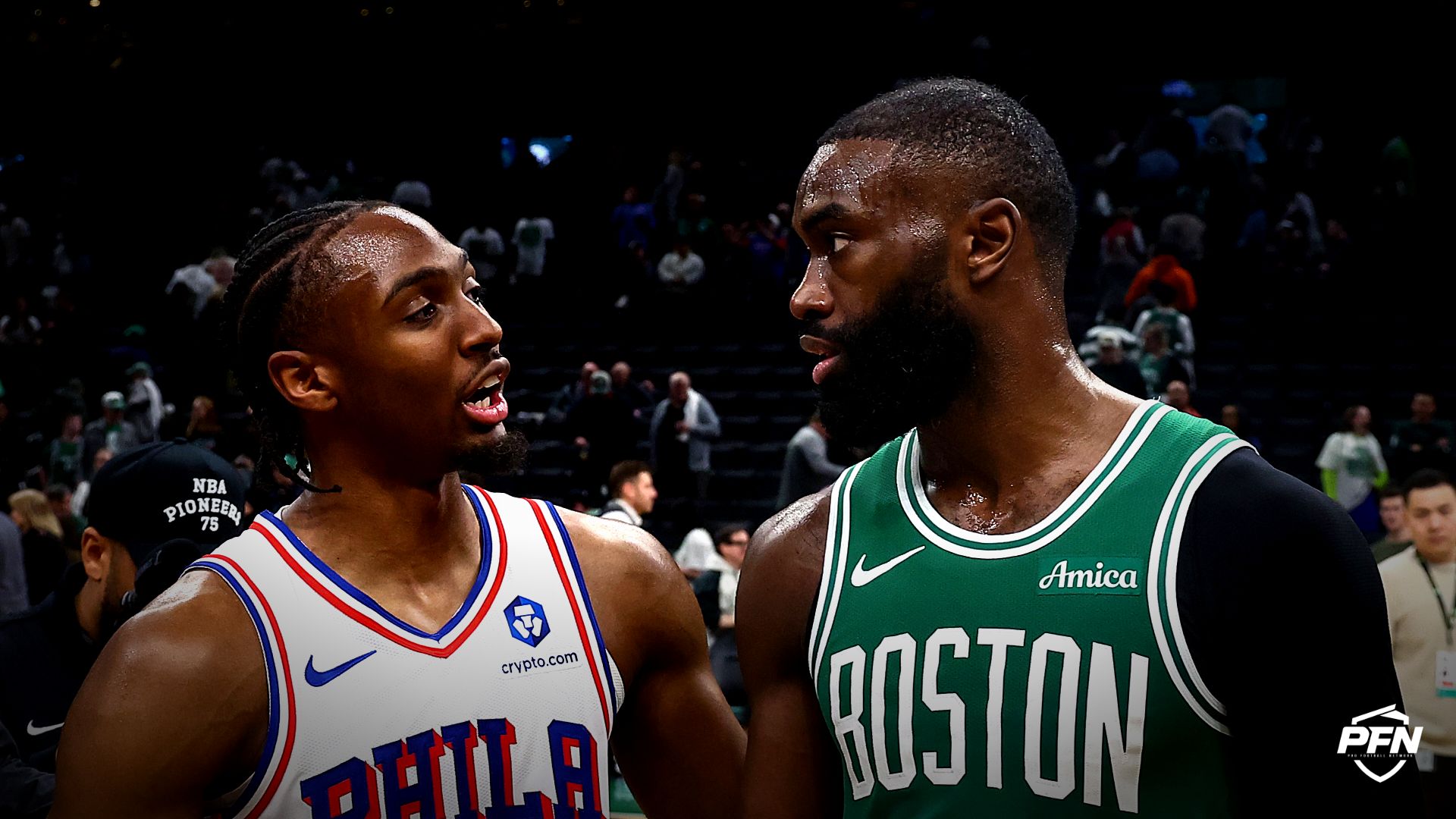Philadelphia 76ers guard Tyrese Maxey (0) talks with Boston Celtics guard Jaylen Brown (7)after PhiladephiaÕs win in game seven of the first round of the 2026 NBA Playoffs at TD Garden.