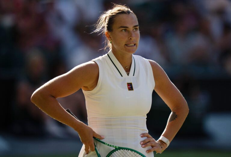Aryna Sabalenka reacts during her match against Jelena Ostapenko of Latvia on day five at All England Lawn Tennis and Croquet Club.