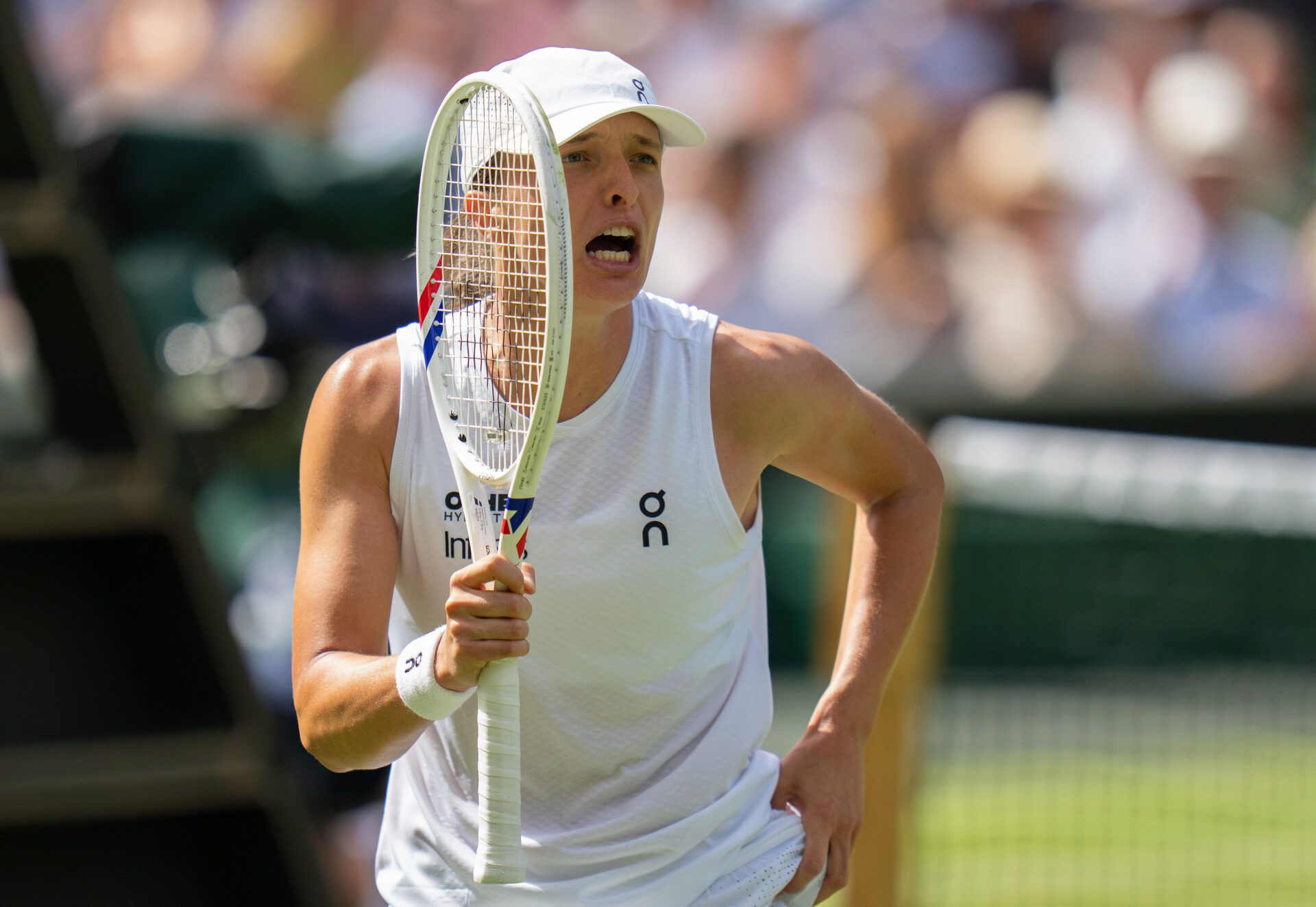 Iga Swiatek of Poland celebrates winning her match against Taylor Townsend of the United States on day two at All England Lawn Tennis and Croquet Club.