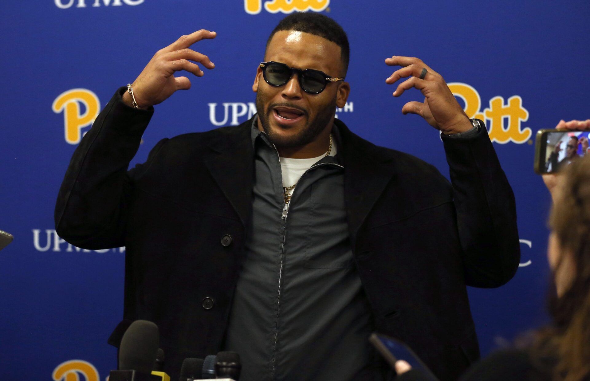 Former Pittsburgh Panther and retired NFL defensive tackle Aaron Donald speaks at a press conference prior to the start of the Pittsburgh Panthers vs Notre Dame Fighting Irish game at Acrisure Stadium in Pittsburgh, PA on November 15, 2025.